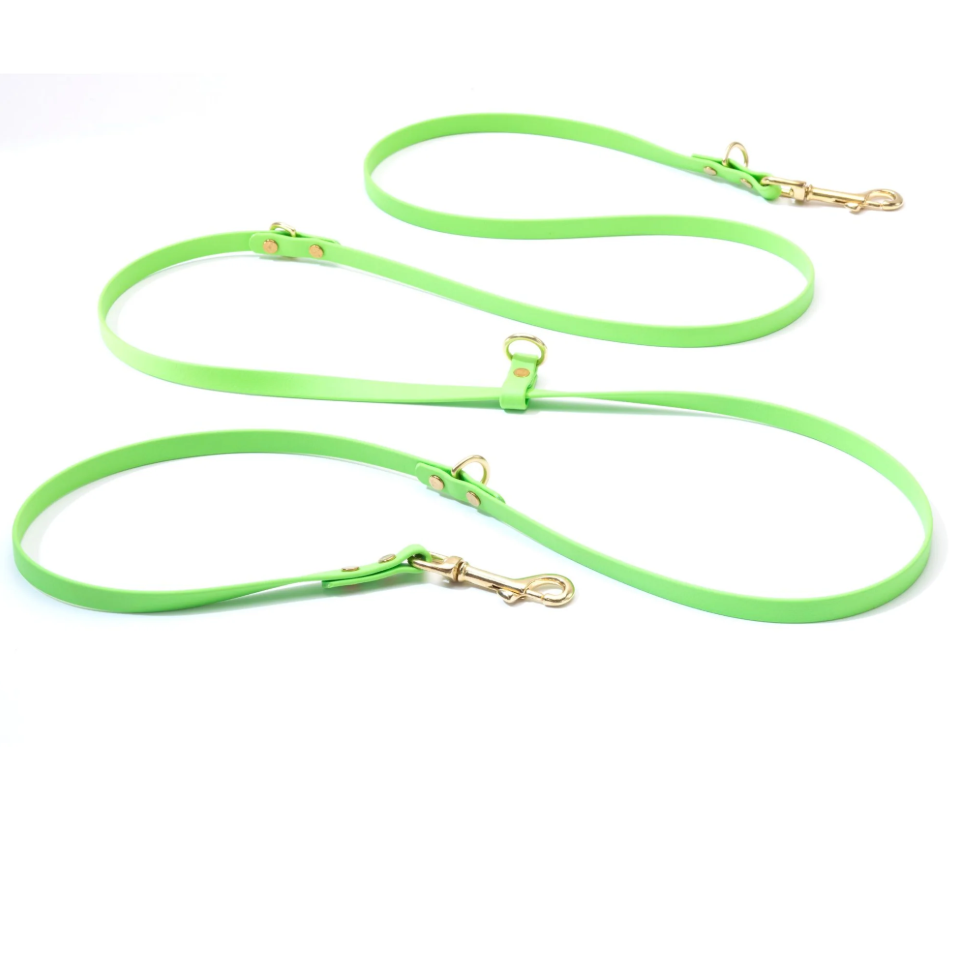 CUSTOM MULTI-WAY HANDS-FREE BIOTHANE LEASHES from HIGH TAIL HIKES. Modular/hands-free capabilities, customizable length (8-30 ft), width (⅜, ½, ¾ inches), color choices, option to add a traffic handle, choice of scissor/bolt snap or auto-locking cara