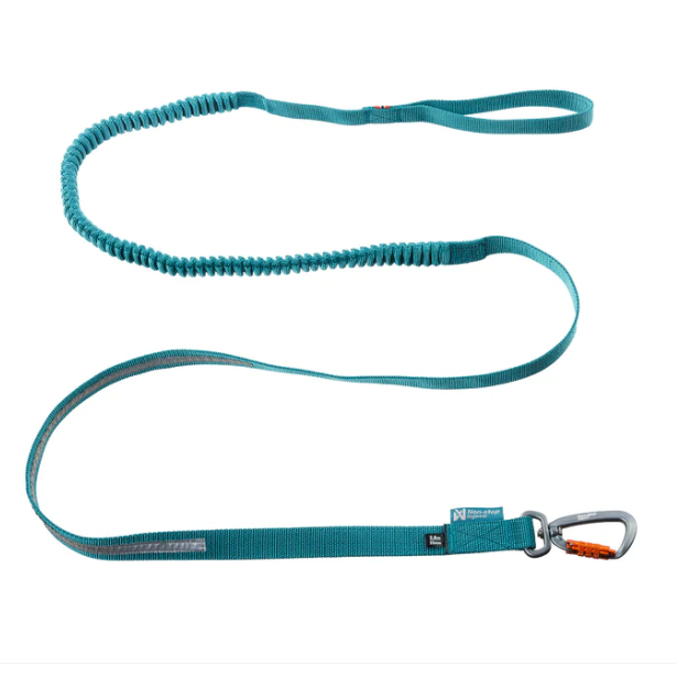 TOURING BUNGEE from NONSTOP DOGWEAR. Twist-lock carabiner, elastic to lessen sudden impacts, reflective detail, available in black or teal, 0.5 or 0.9 inches wide, and 1.2 or 3.8 meters long (~4 or 12 ft). $34-54
