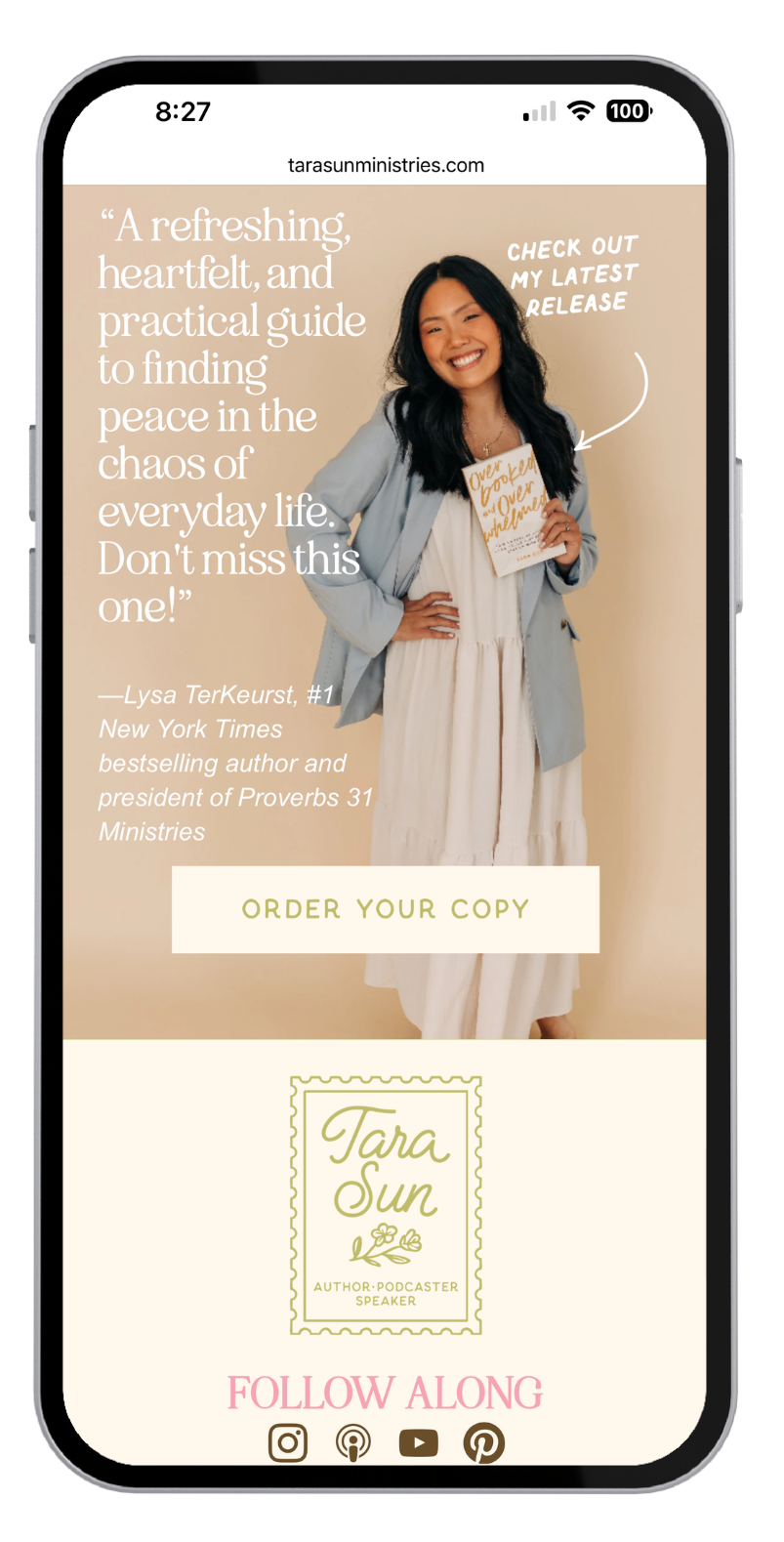iPhone mockup of Tara's website with a photo of tara standing, holding her new book, and her personalized line drawn stamp that says, "Tara Sun"