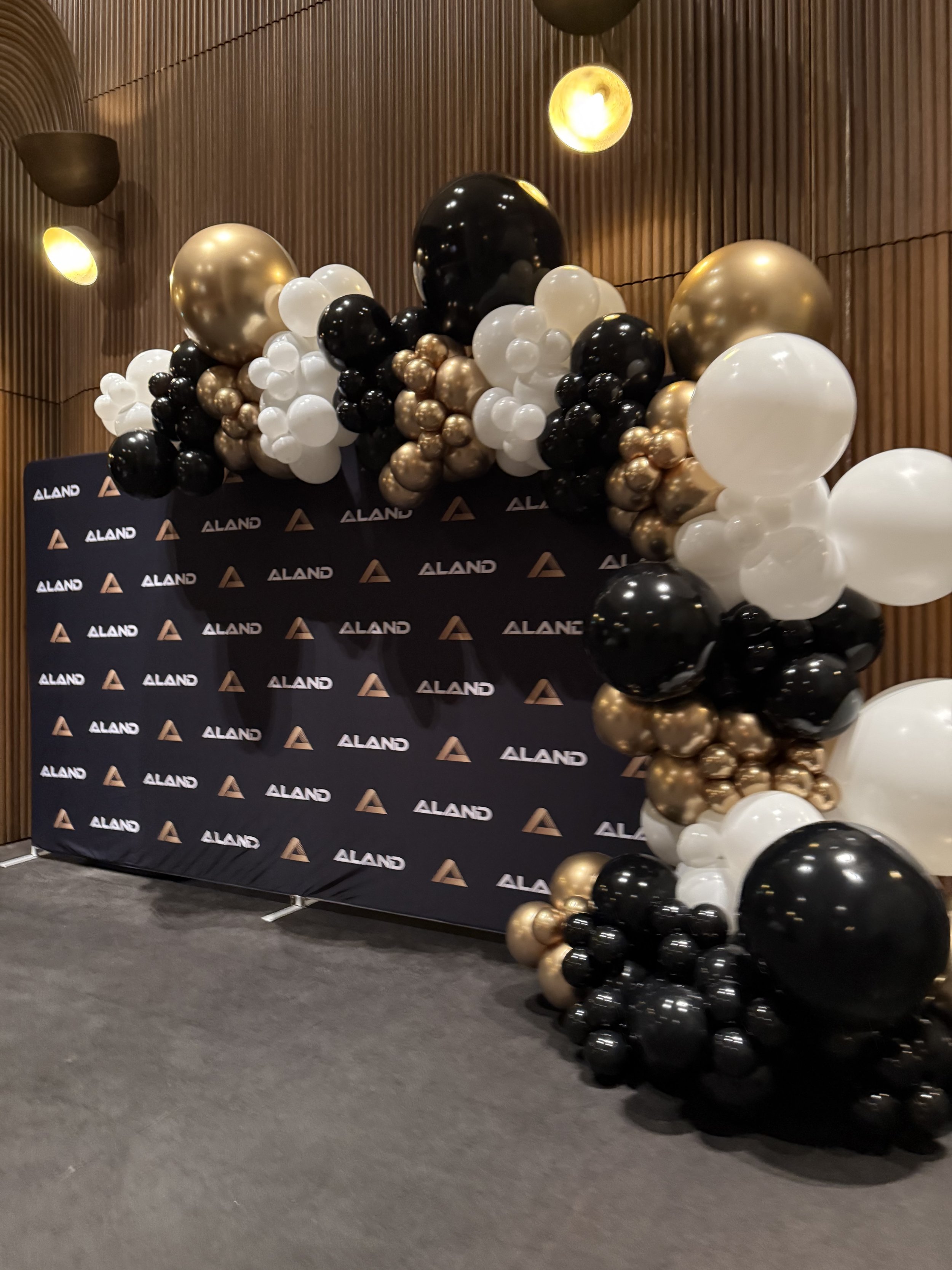 corporate balloon garland media wall.jpeg