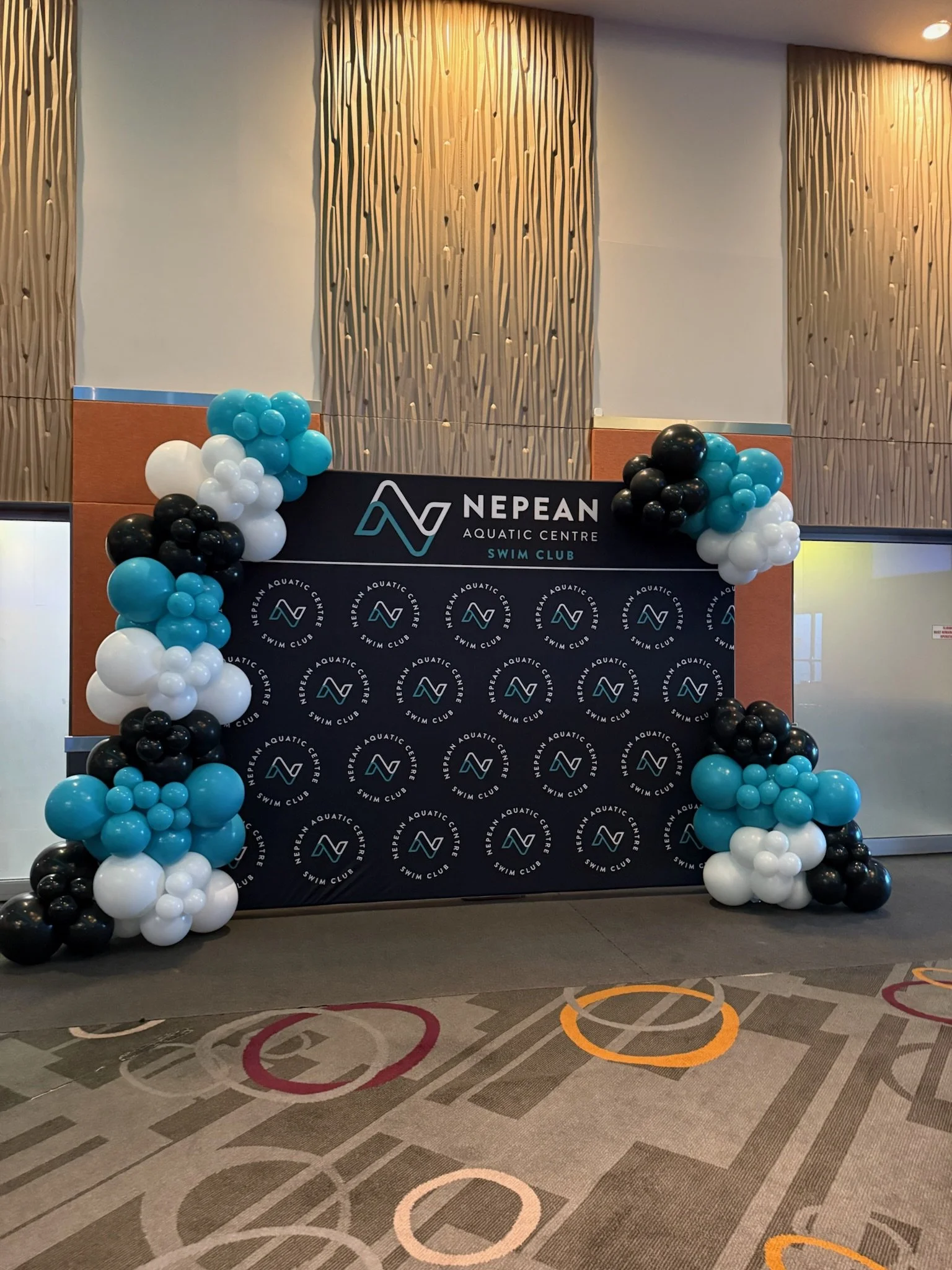 corporate media wall and balloons.JPG