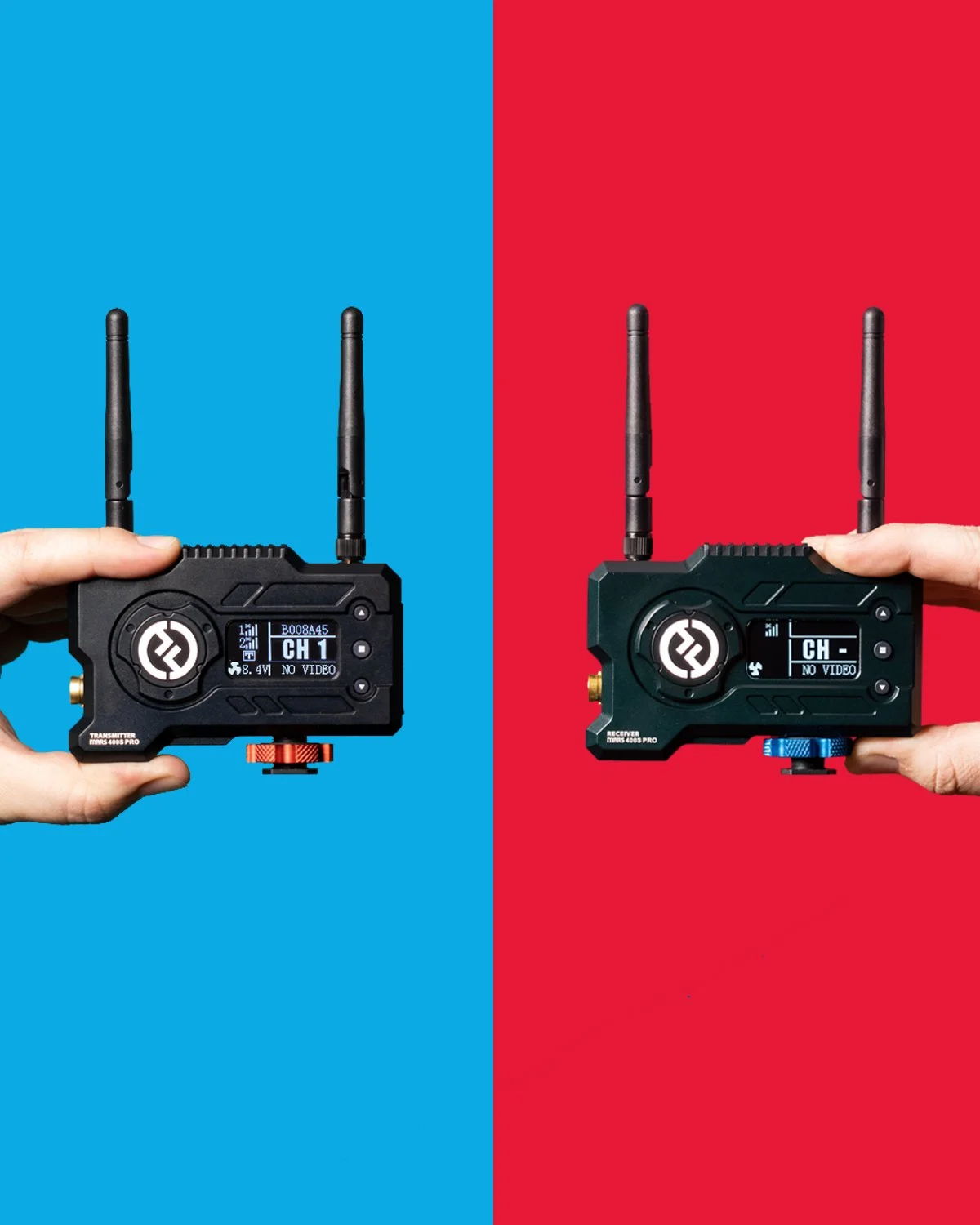 Two wireless video devices, one transmitter and one receiver, held by hands, set against a split blue and red background.