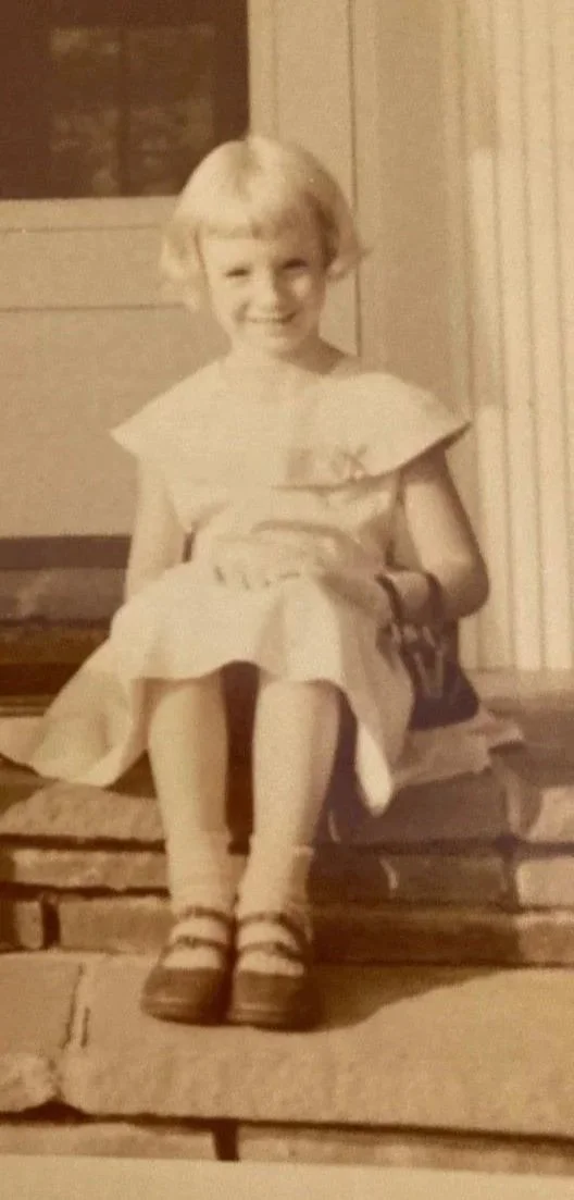 At age five, in my favorite pink dress