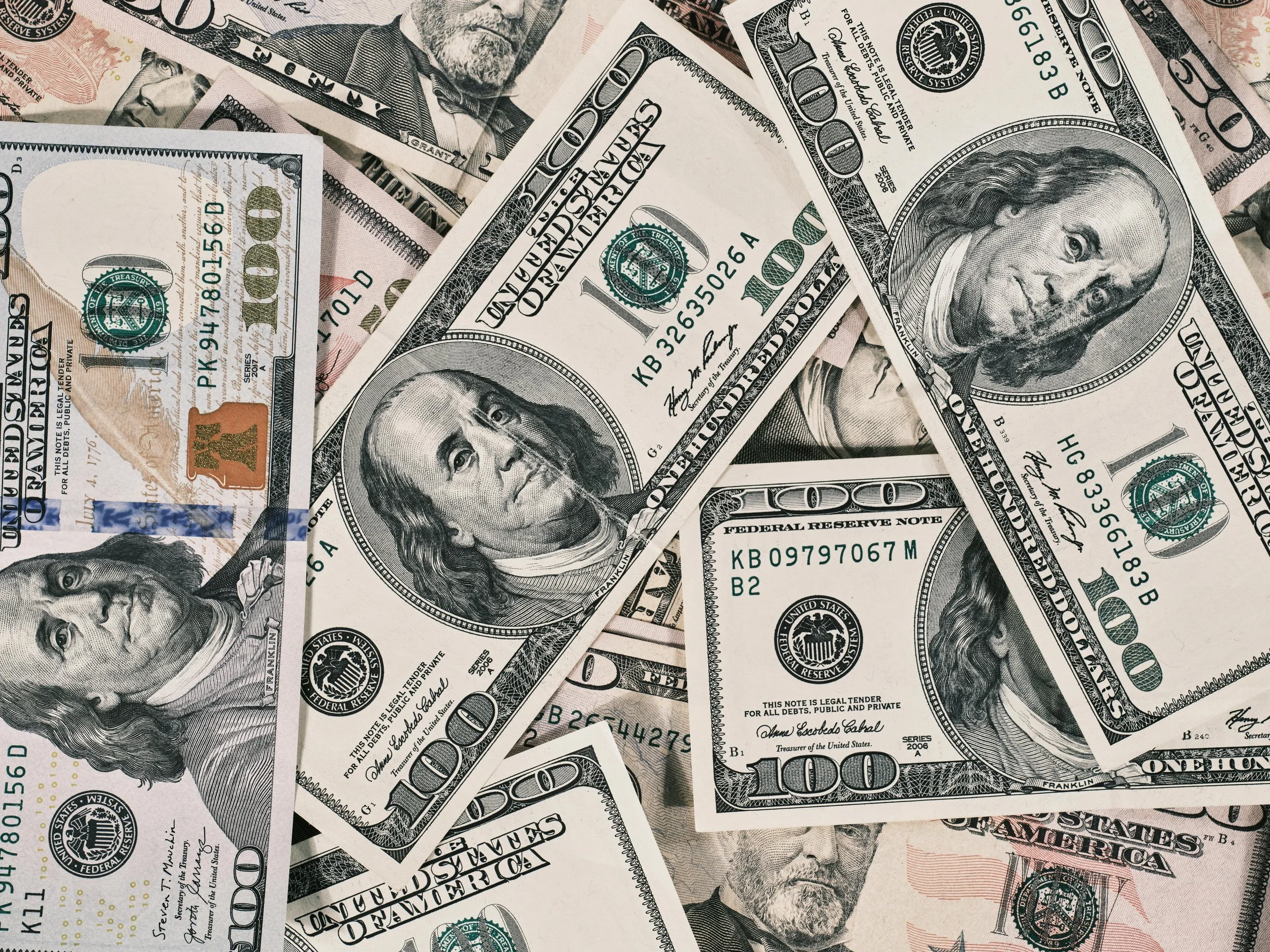 Geometric drawing of an outline square with sections divided by vertical, horizontal, and half circle lines.