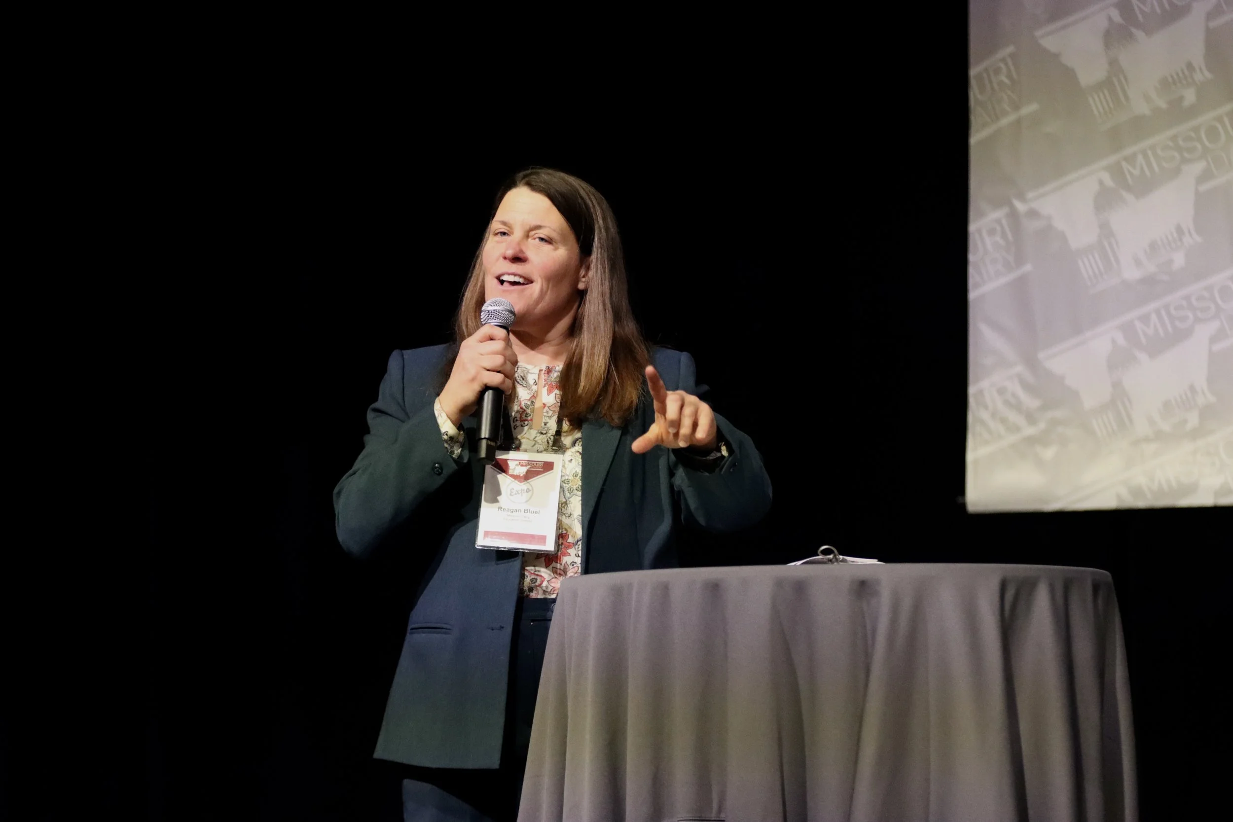 Woman speaking at dairy expo