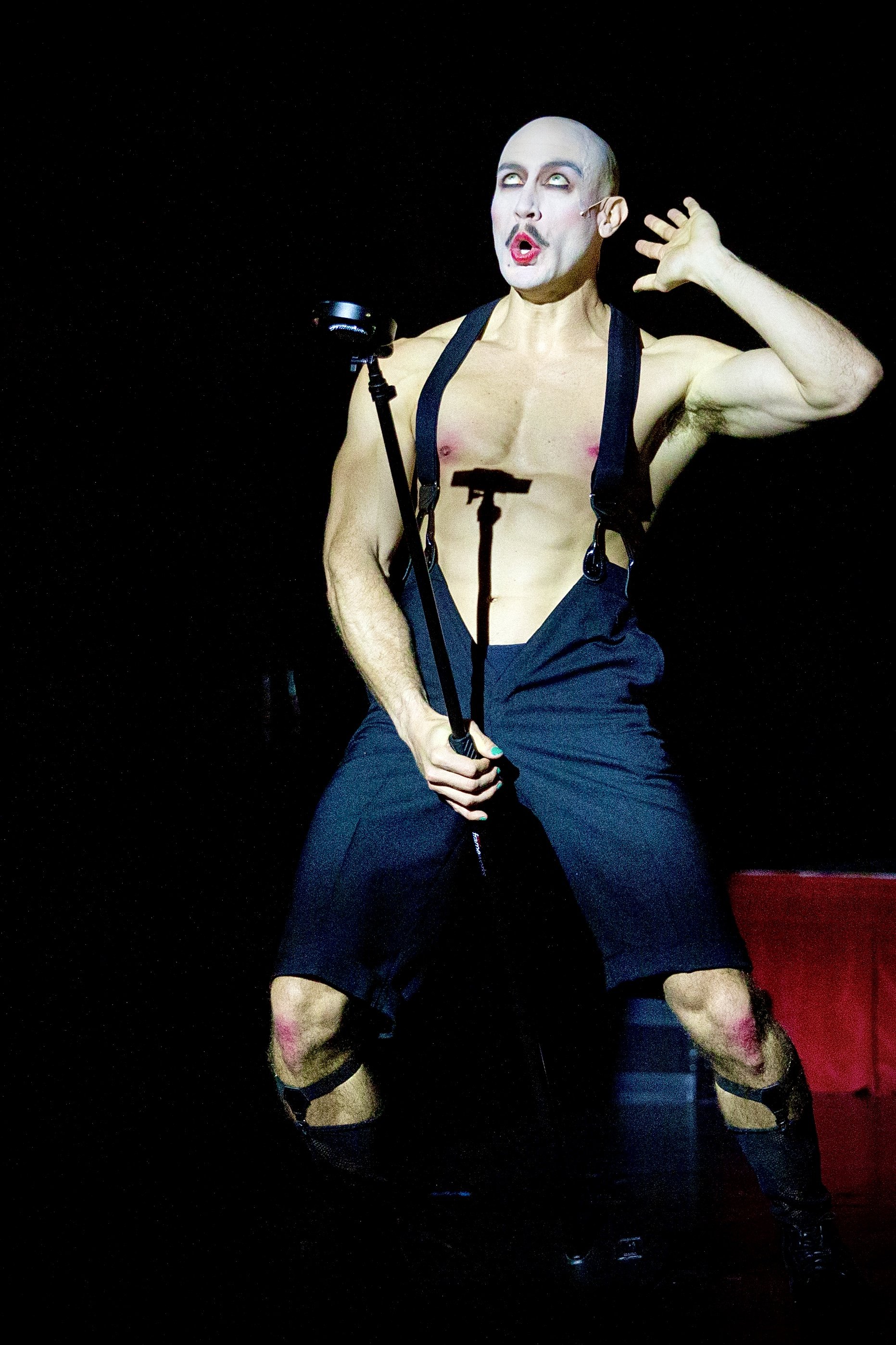 as the Emcee in Cabaret