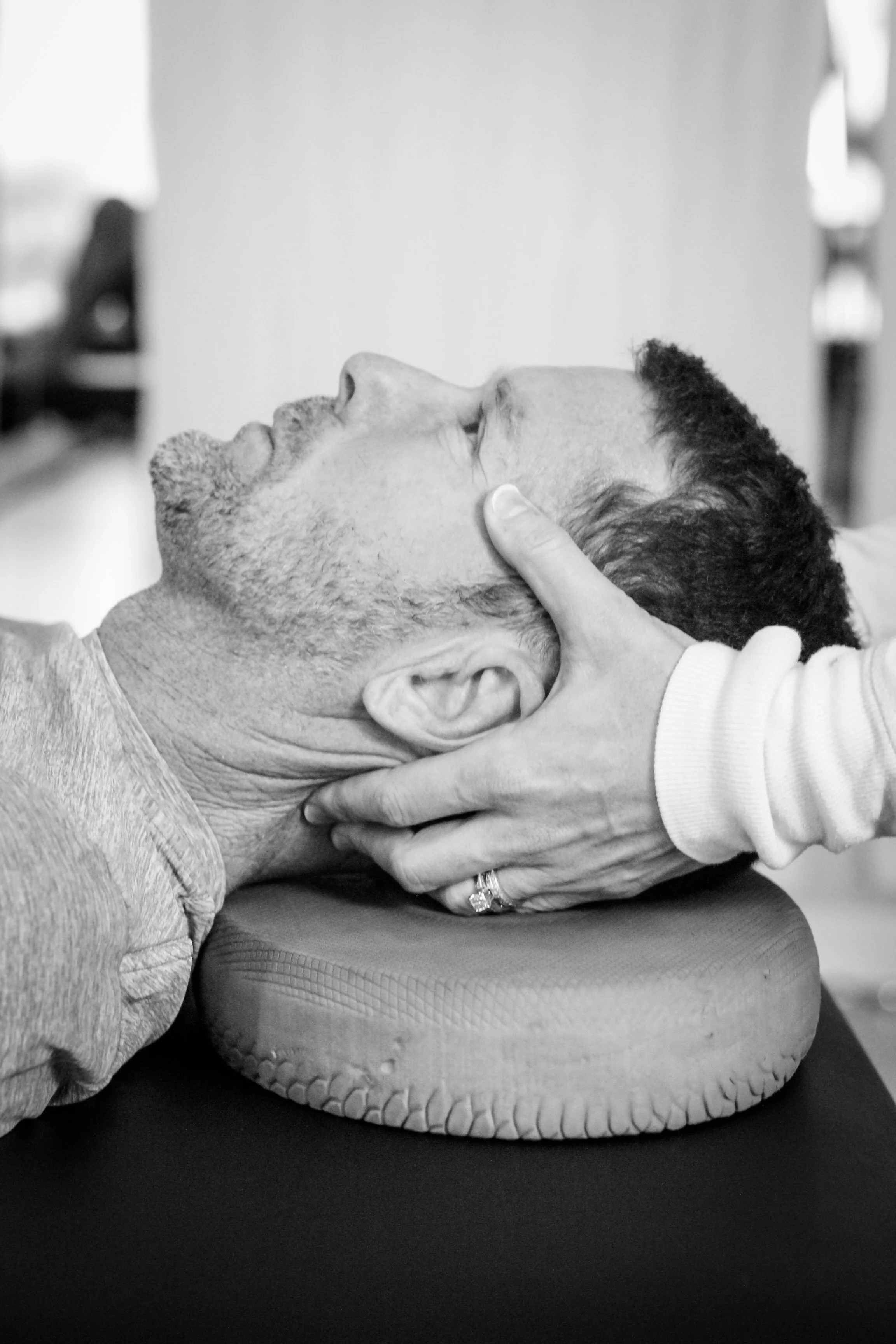 Rebecca Brown, DPT, offers physical thearpy for TMJ Dysfunction on a patient at Posture Studio in Charlottesville, Virginia