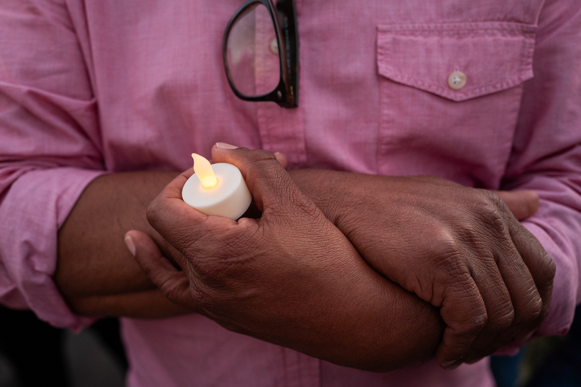 Altadena community members hold a vigil for the 18 people who passed away in the Eaton Fire on the six-month anniversary of the fire, Altadena, July 7, 2025.