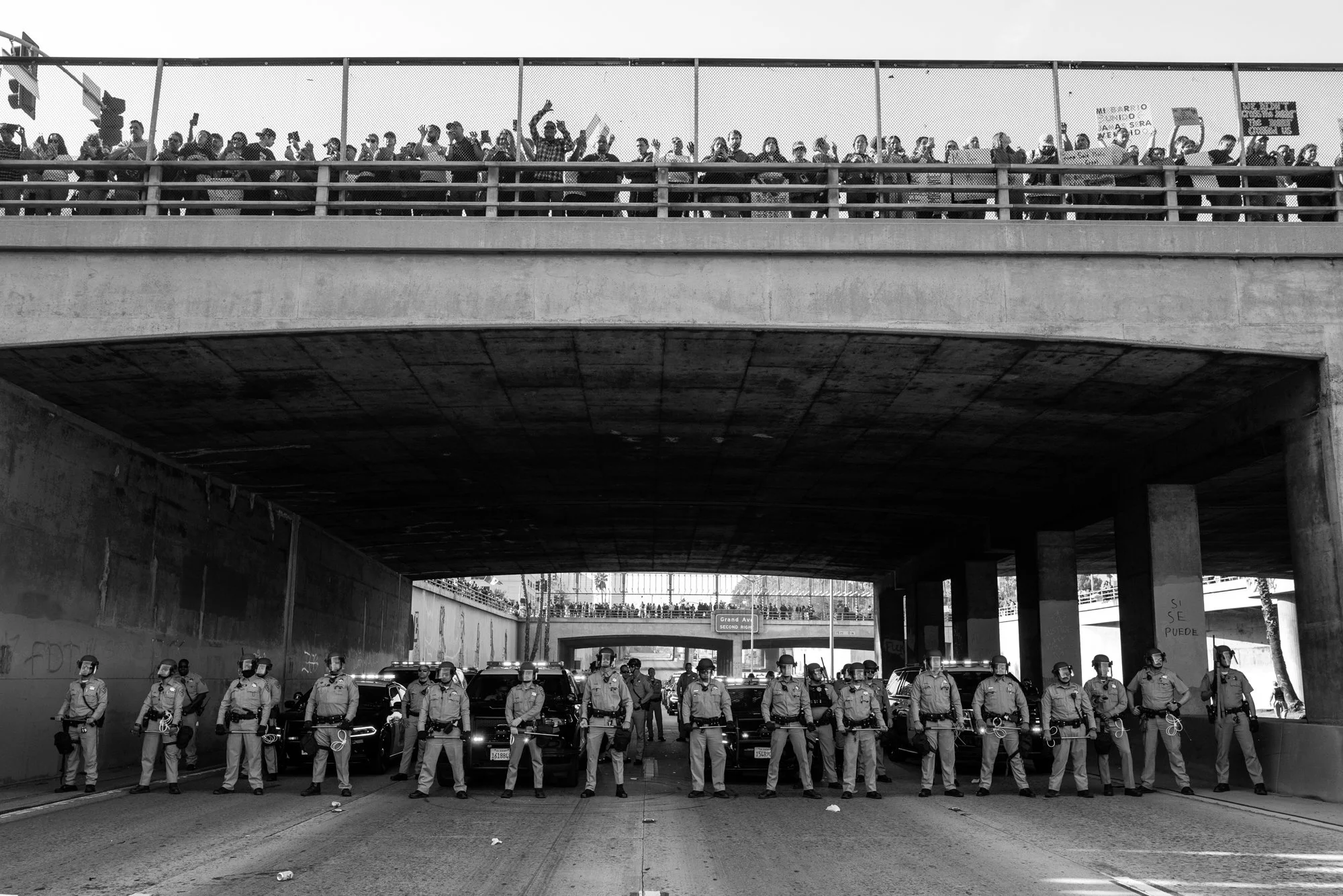  Protestors marching against President Donald Trump’s immigration policies face law enforcement on the Hollywood (101) Freeway.  Los Angeles, CA, USA (2/2/25) 