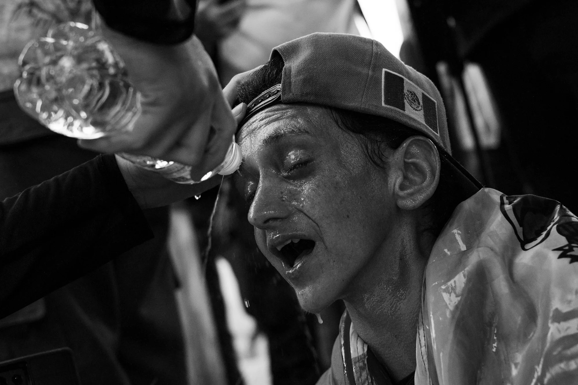  A protester has water sprayed in their eyes after being tear-gassed outside the Metropolitan Detention Center in downtown.  Los Angeles, CA, USA (1/10/26) 