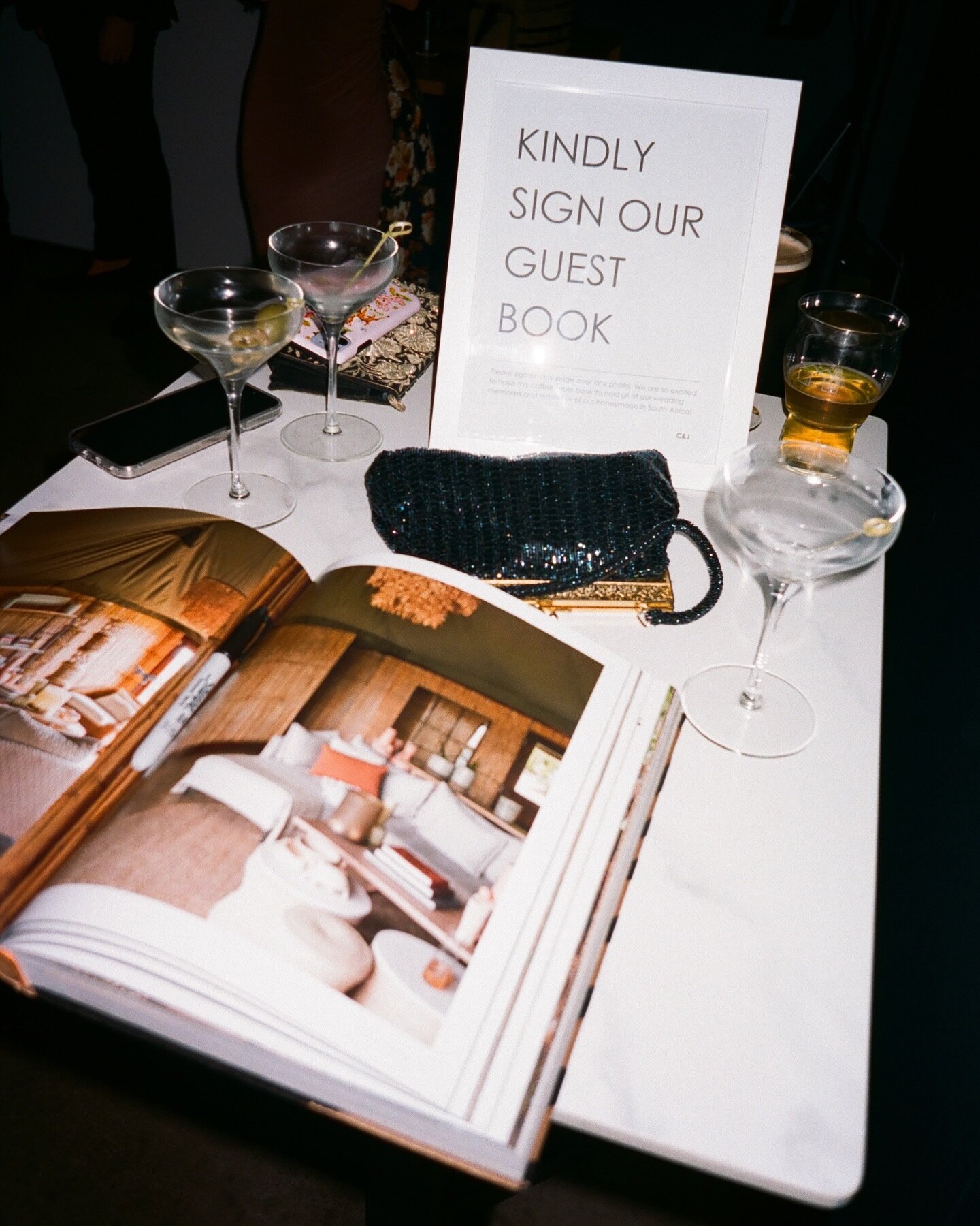 I absolutely adore when people get a coffee table book to use as their guest book. It&rsquo;s so perfect and you can get something that really speaks to both of you.
⠀⠀⠀⠀⠀⠀⠀⠀⠀
Shot on portra 400 from @caitlinsteen &amp; @jakehuber8&rsquo;s wedding //