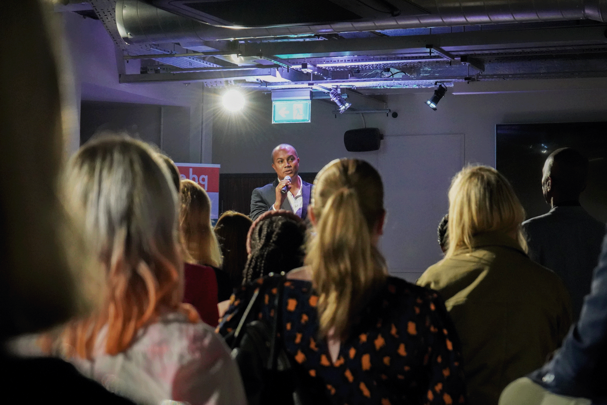 A speaker talking at a Leeds Digital Festival (2023) event in front of an audience, in The Chamber at Avenue HQ East Parade.