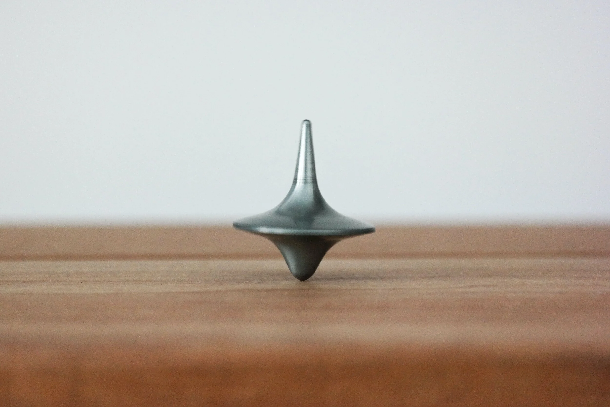 A spinning top, depicting balance