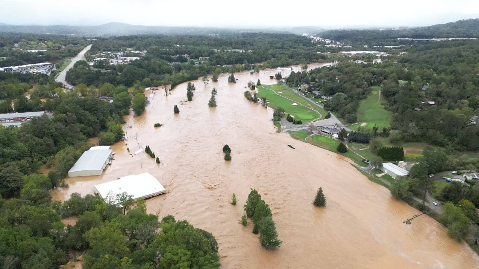 photo of swannanoa river flooding asheville muni golf course