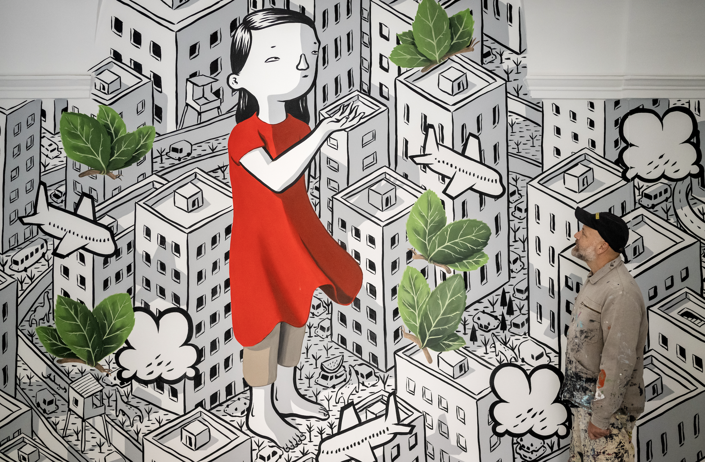 Millo creating a site-specific mural for Countless Cities at the Museum of the Cities of the World in Palermo.