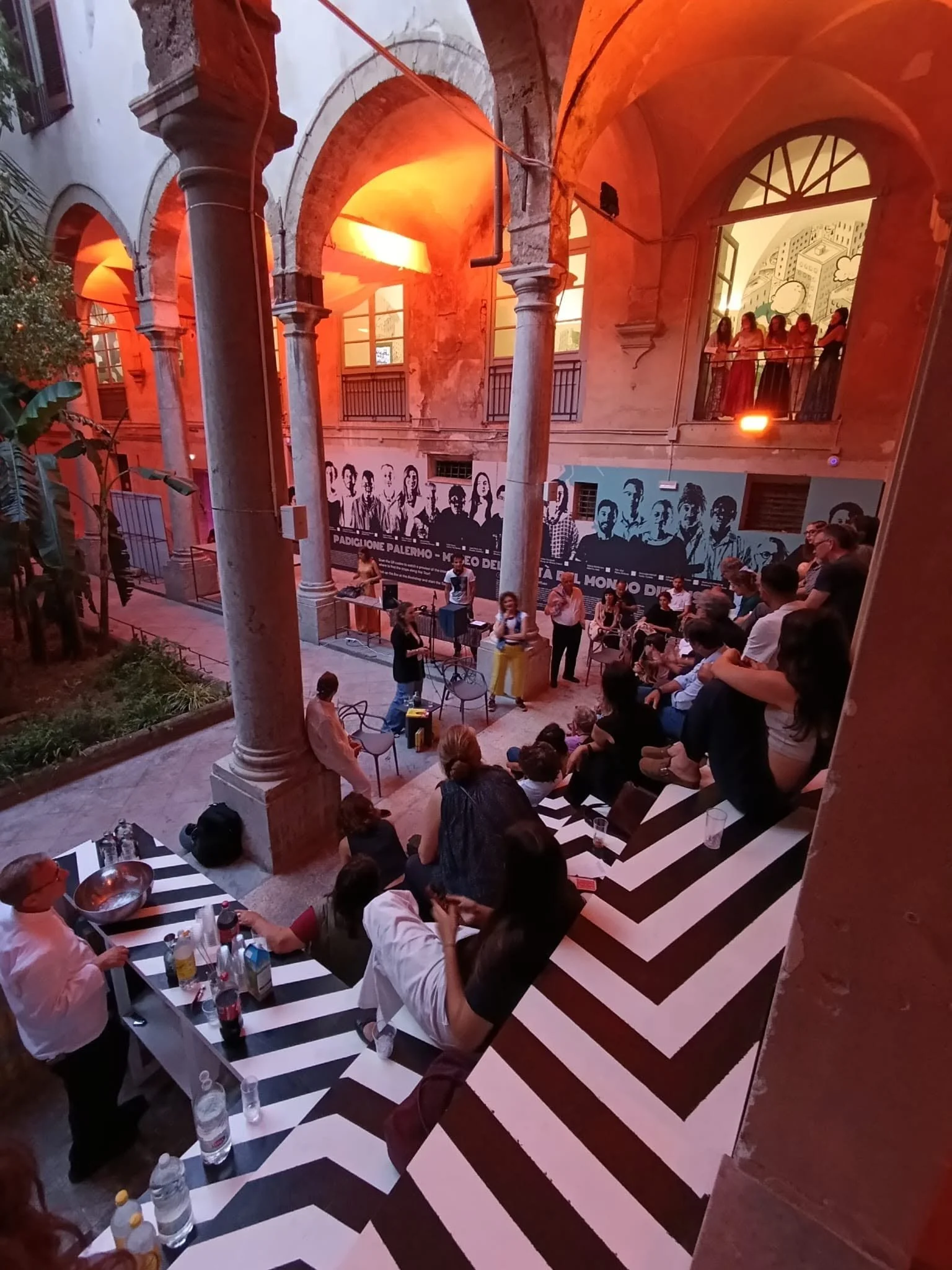 Participants taking part in a Countless People Talk at the Museum of the Cities of the World in Palermo.