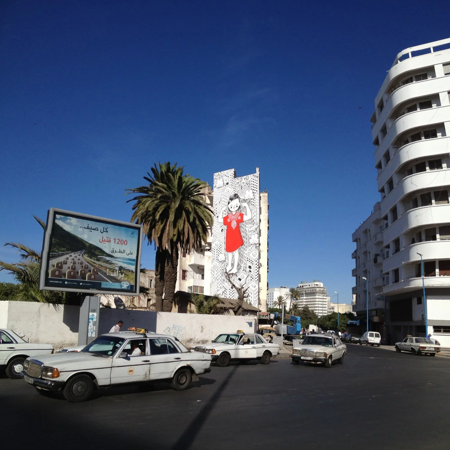 “Enjoy the Silence,” a mural by Millo in Casablanca depicting a solitary figure immersed in the urban landscape.