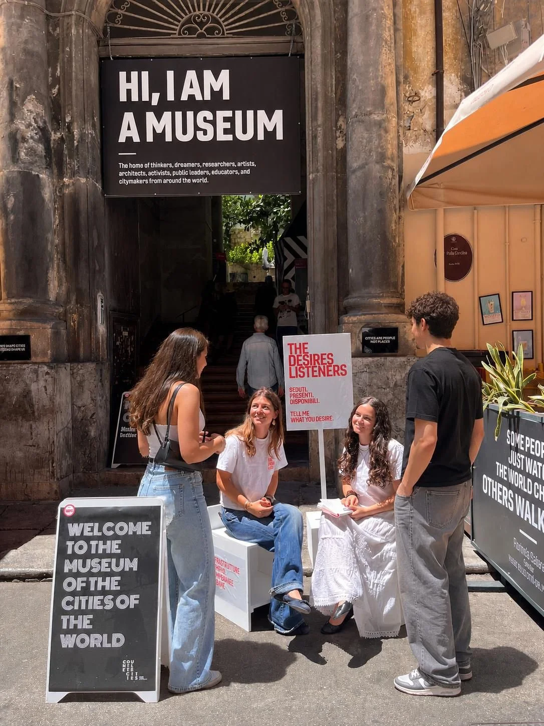 The Desire Listener performance welcoming participants at the entrance to the Museum of the Cities of the World in Palermo.