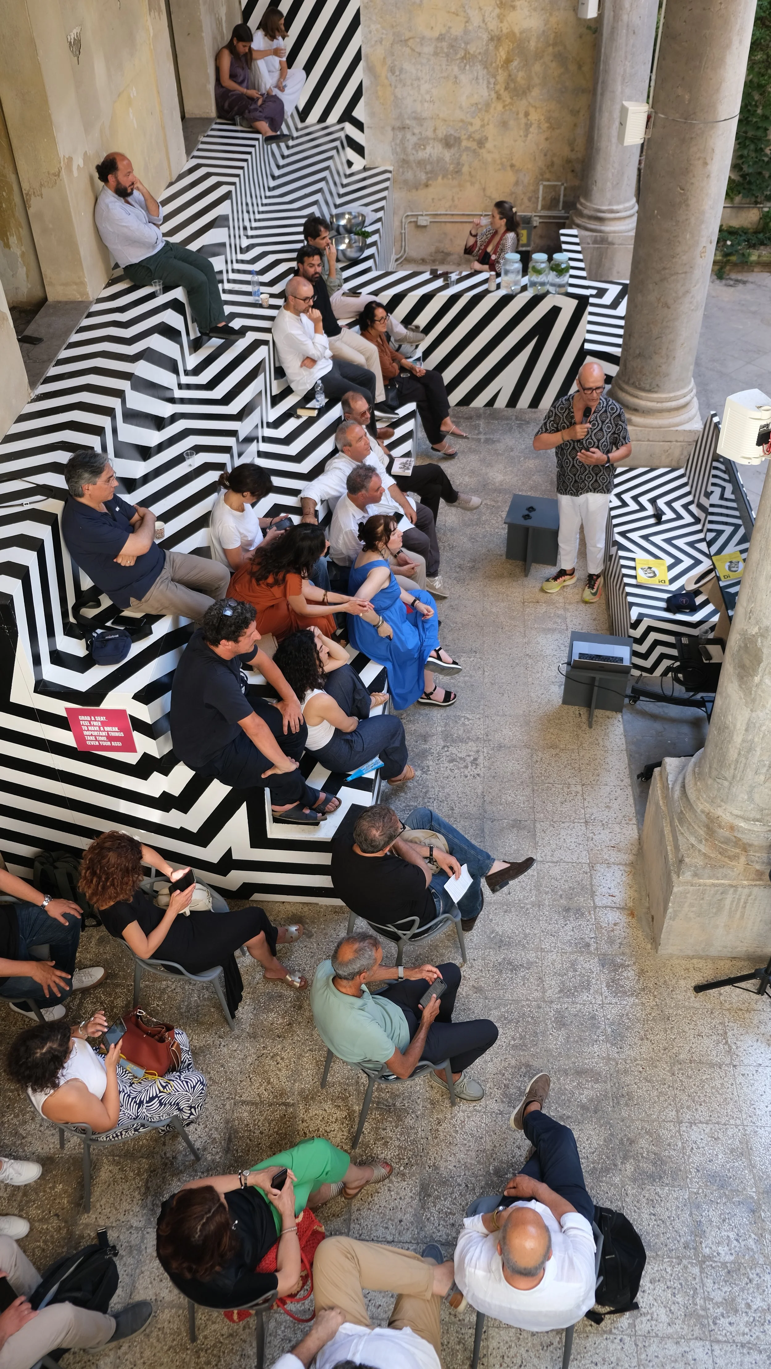 Pino Scaglione presenting the D On Tour project at the Countless City Knowledge Center in Palermo.