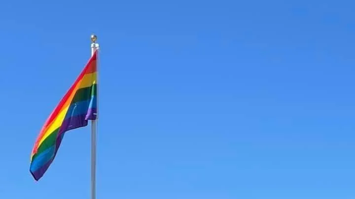Pride Flag flying at the Ottawa Catholic School Board Catholic Education Center
