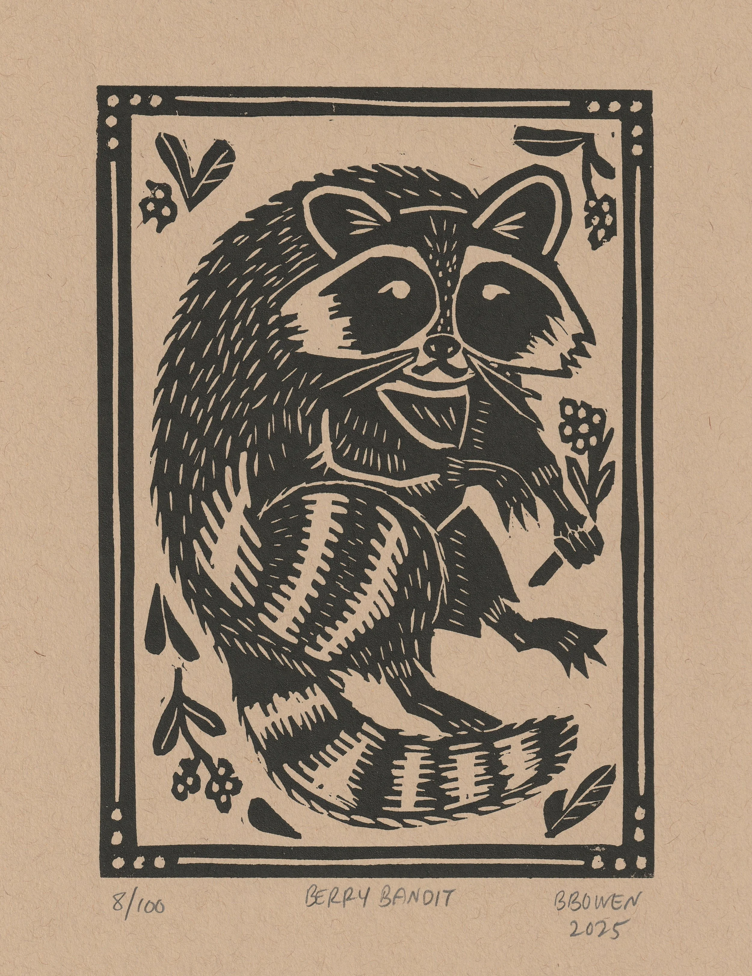 "Berry Bandit", linocut print of a raccoon holding a sprig of berries, on tan paper, 2025