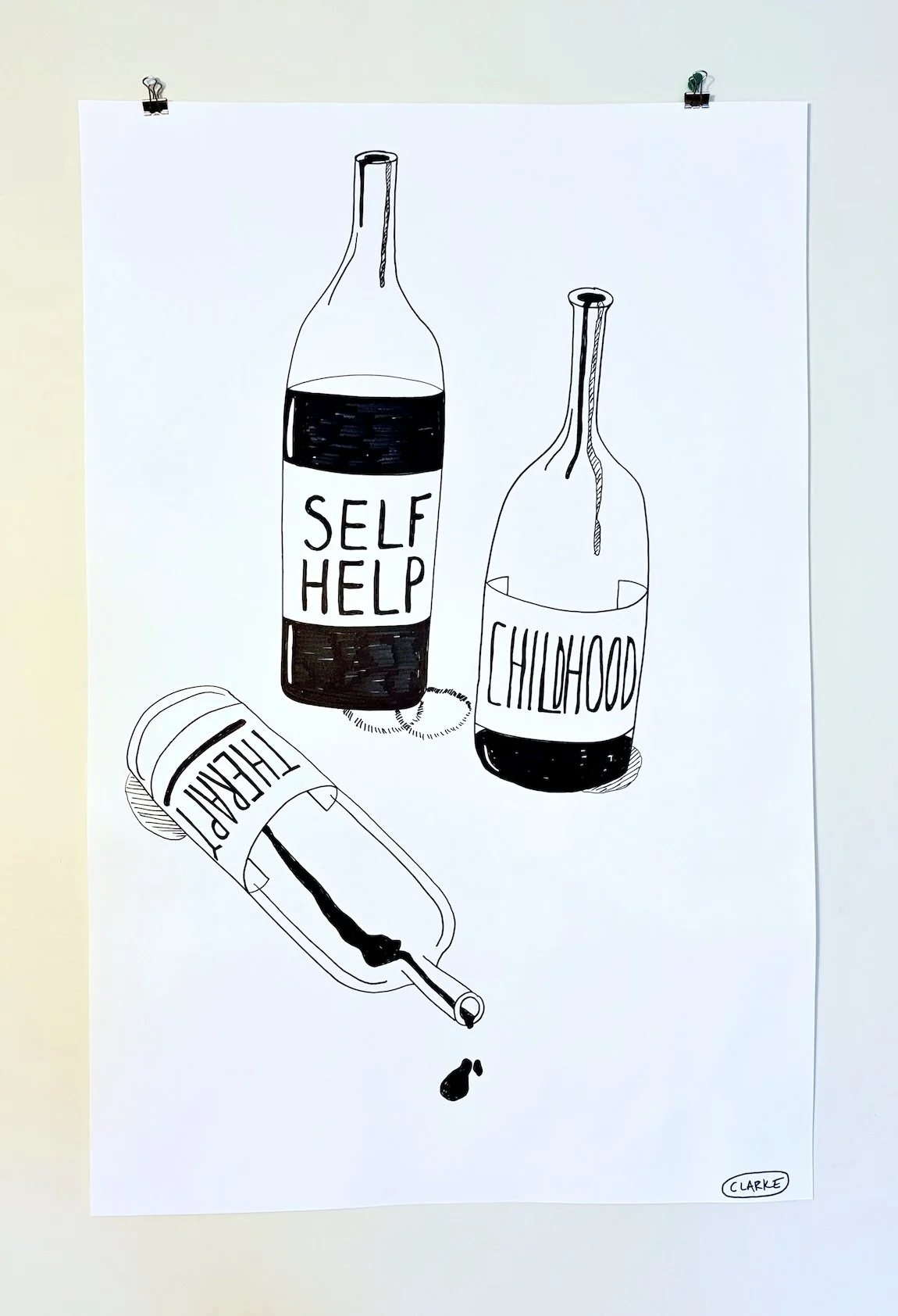 A black and white drawing of three bottles, one labeled "Self Help," another labeled "Childhood," and the third lying on its side with a drop spilled from it. The drawing has a minimalist style and is signed by CLARKE.