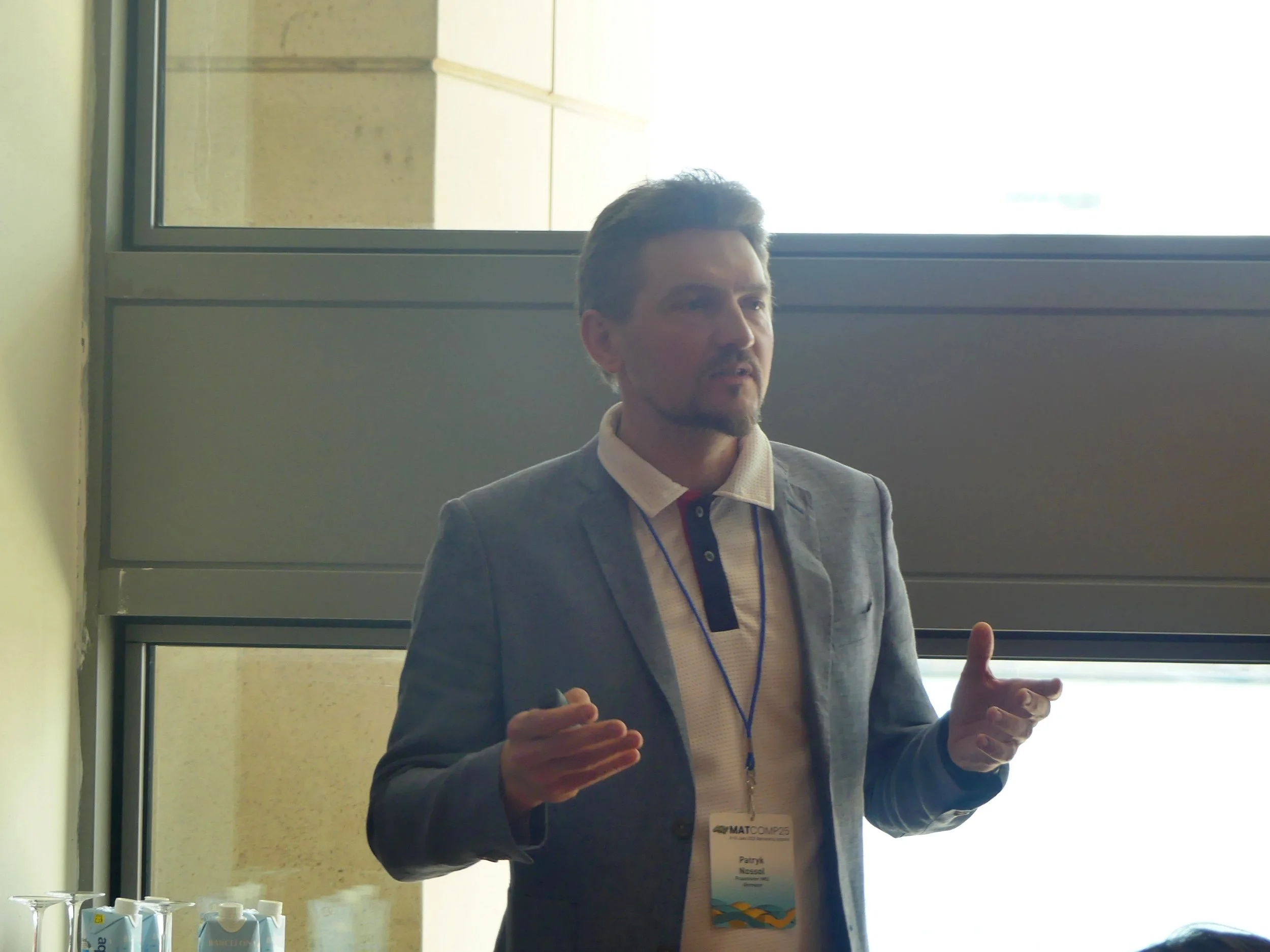 Patryk Nossol from Fraunhofer IWU highlighting the product design of essential front-end components during his presentation.