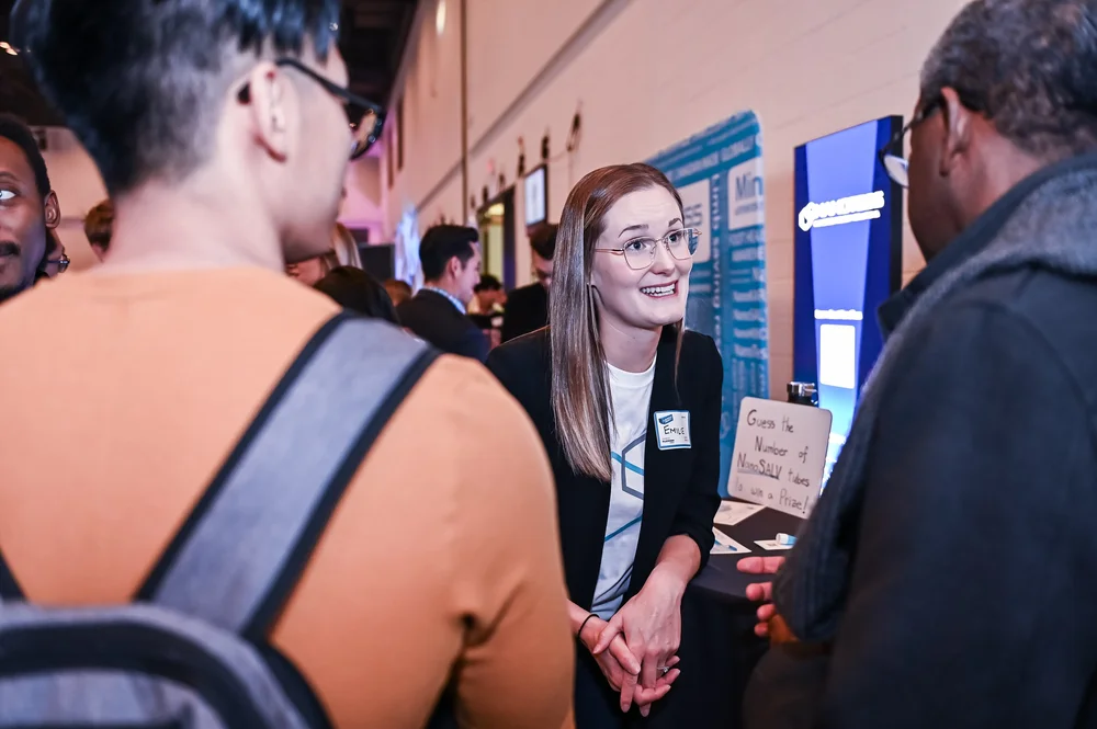People meeting at a Calgary tech event