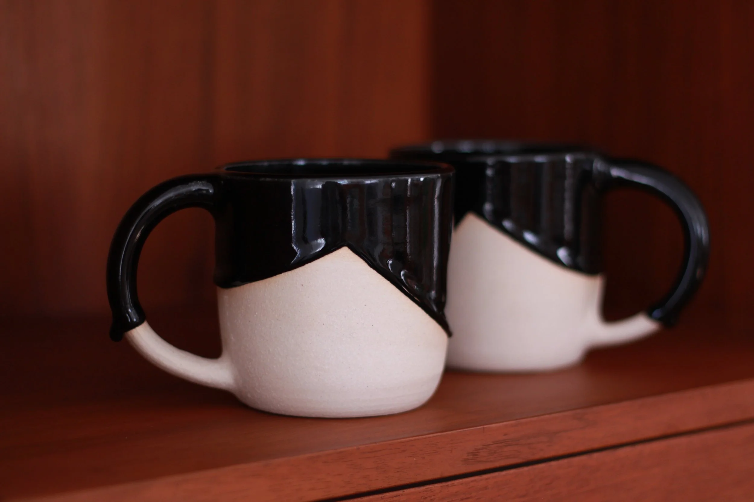 black mugs on cabinet.jpg