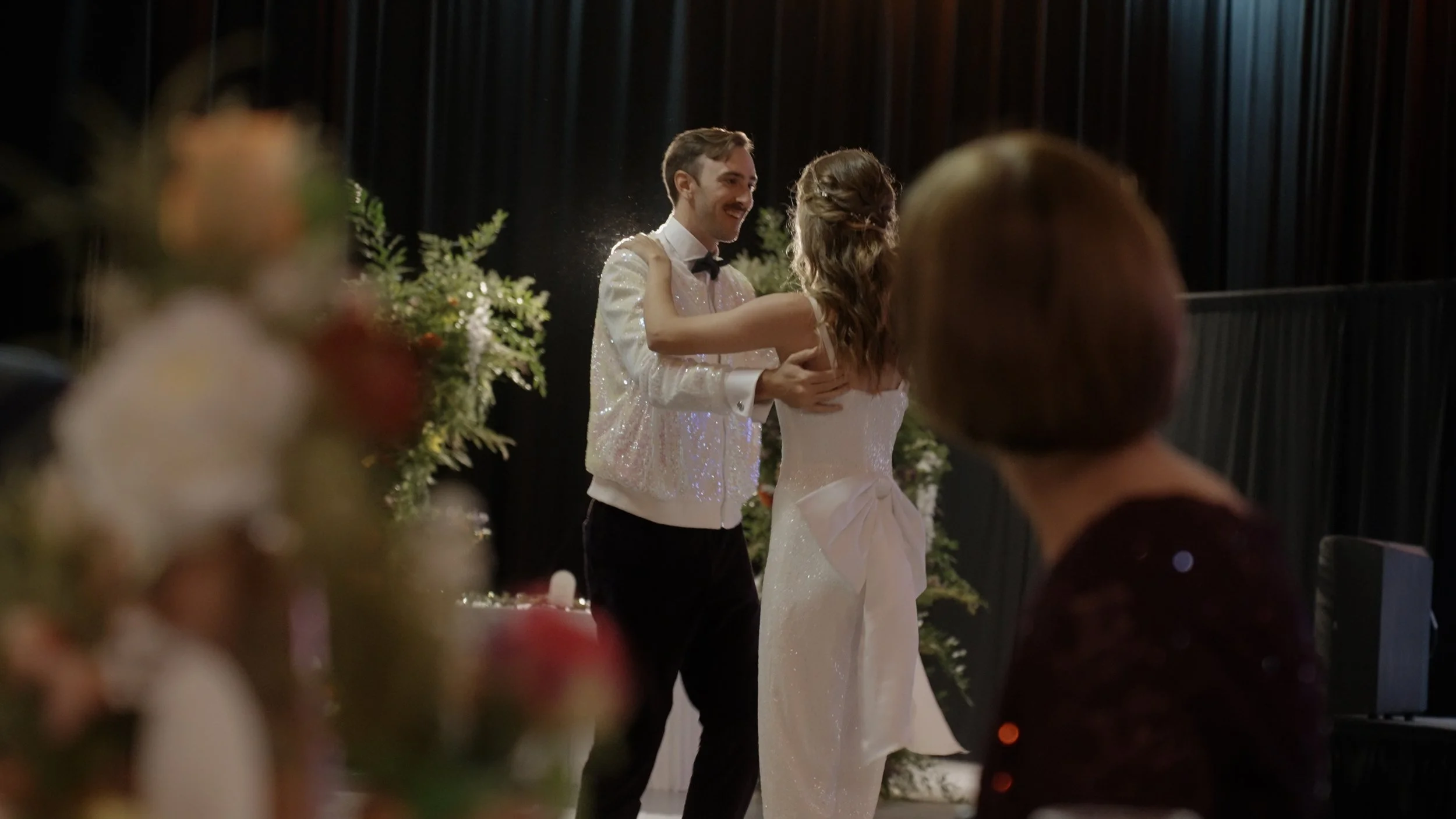 How I Photograph and Film Dark Wedding Receptions Without Ruining the Atmosphere