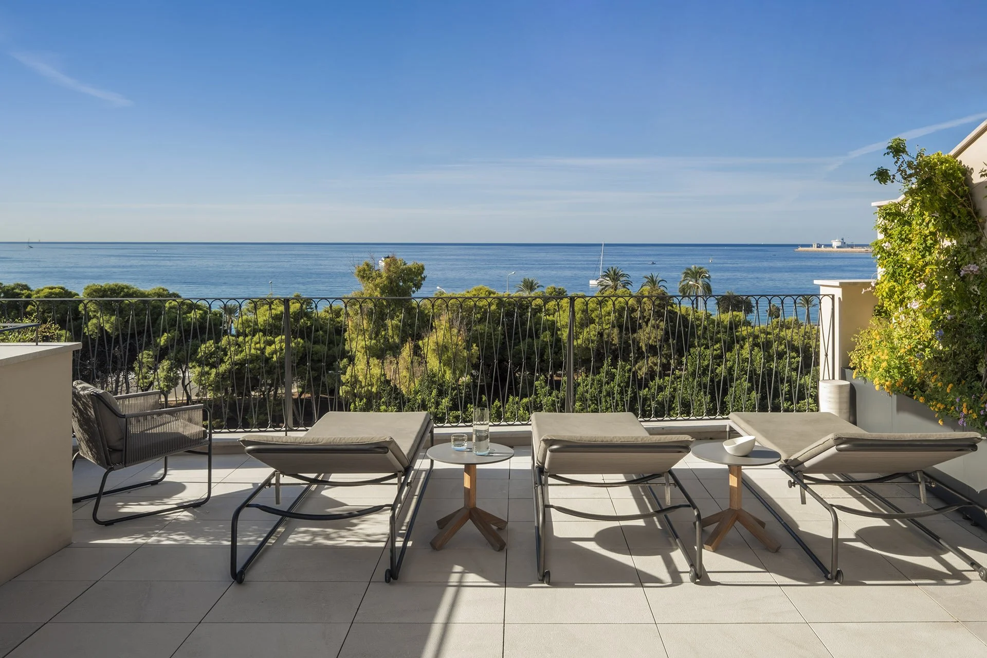 Sun loungers overlooking the Mediterranean from Villa Calatrava rooftop terrace