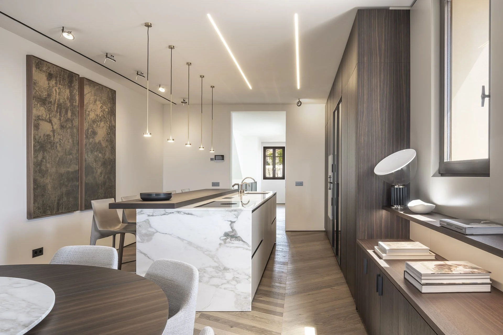 Marble kitchen island and pendant lighting at Villa Calatrava