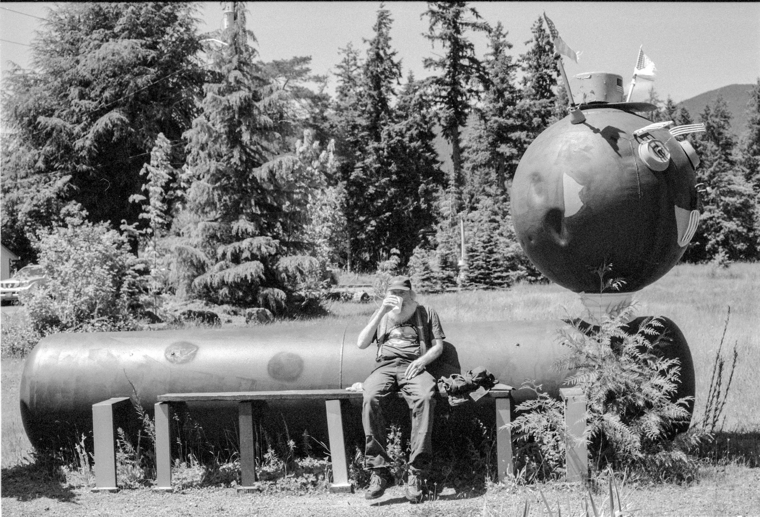 Man chilling with coffee-35mm film