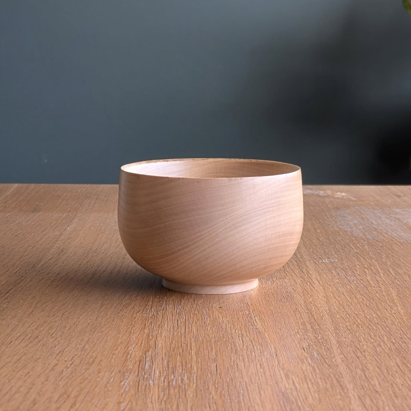 Turned from sycamore &mdash; pale, consistent, and quietly reflective.

An upright form with a gentle taper at the base, just enough to give it a bit of lift.

The grain is subtle and tight, with that soft shimmer sycamore sometimes shows when the li