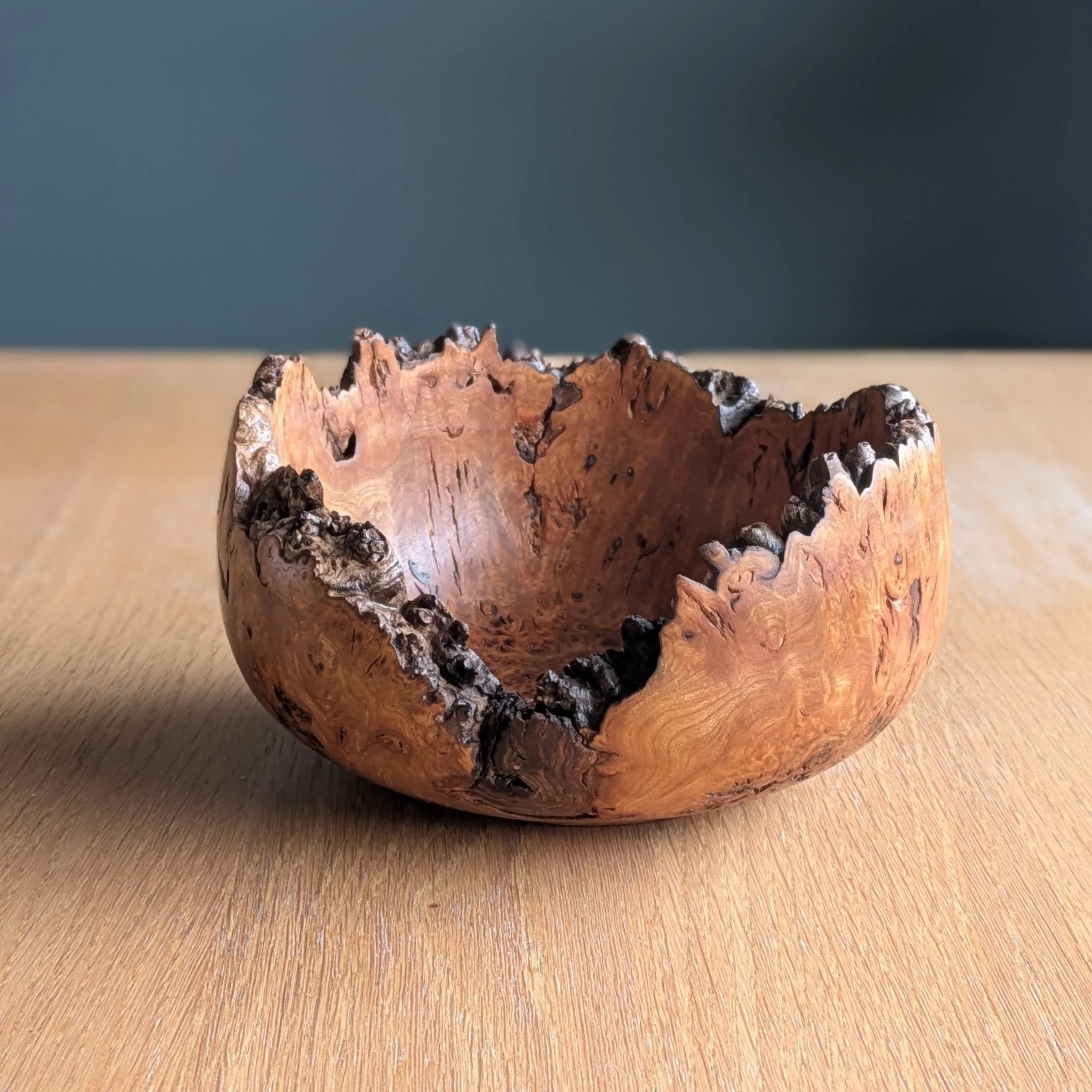 My love affair with burr elm deepens. 

This was no.10 in the series - finished up last week. When I saw the void on the blank, I knew this was going to have a nice dramatic edge. It did not disappoint.