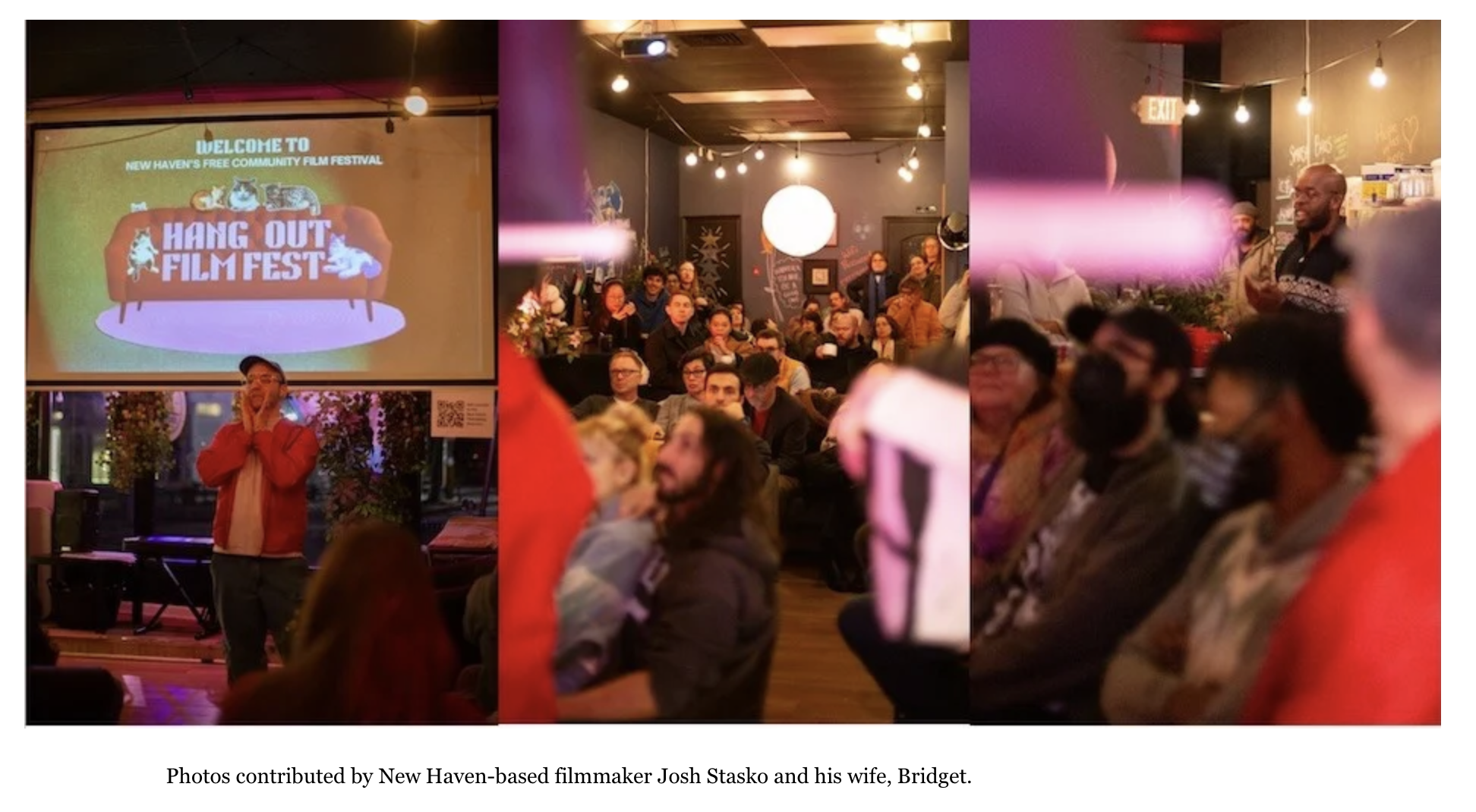 An indoor event space filled with people seated and watching a presentation on a large screen. The screen displays a logo for the 'Hang Out Film Fest' at the New Haven's Free Community Film Festival. A person in a red jacket and baseball cap stands in front of the audience. The room has warm lighting, decorated walls, and some chalkboard art.