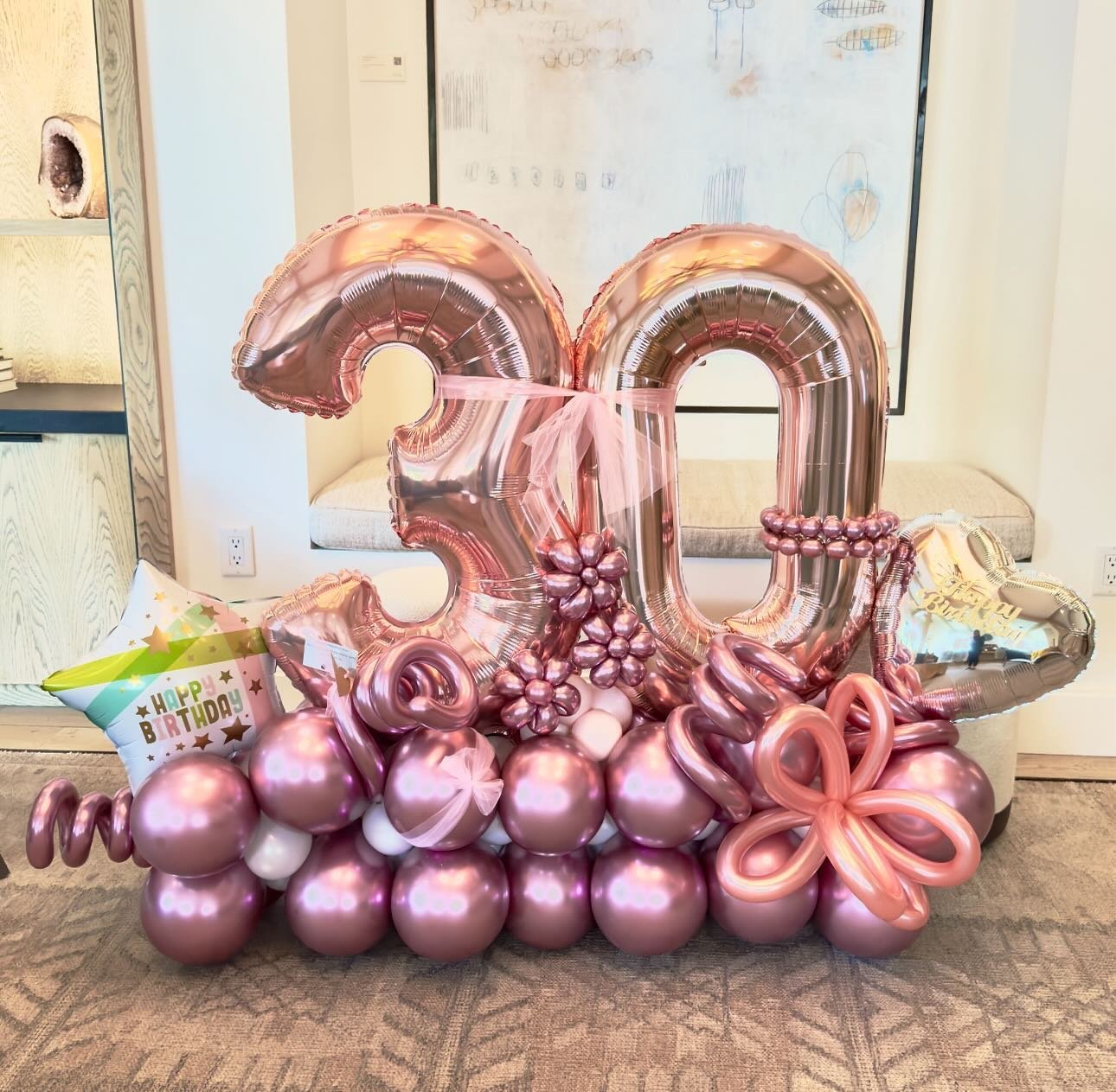 Pretty in pink! We take pride in crafting these stunning balloon marquee bouquets. Did you know these bouquets can maintain their beauty for several weeks when displayed indoors? Preserve cherished memories and make a bold statement for someone&rsquo