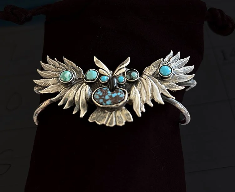 Aliotti-John_JAA-Designs_bracelet-cuff-jade-and-silver-owl-wings-splayed 750x615.jpg