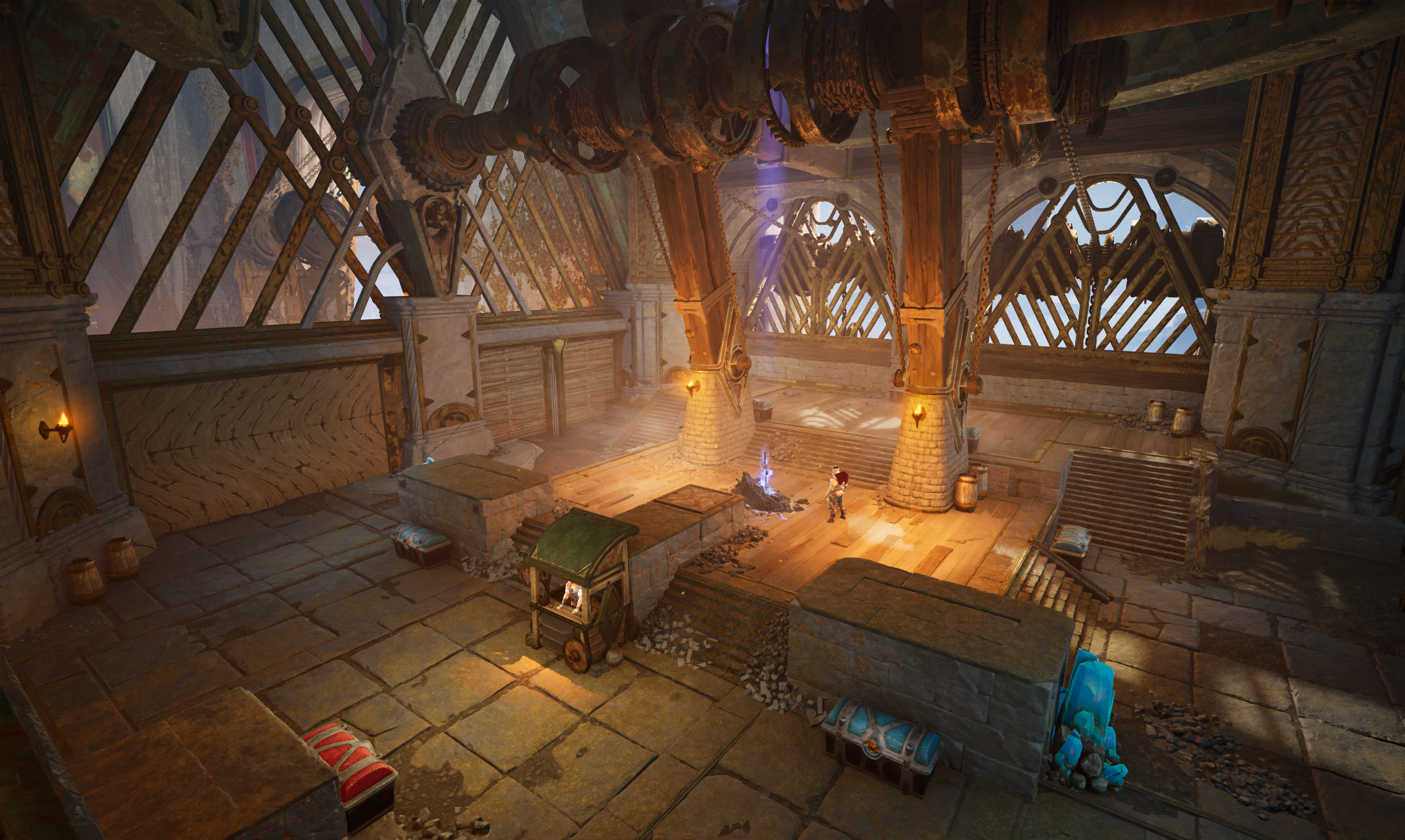 An interior scene from a video game with ancient ruins, stone flooring, and large metallic gears, pipes, and hanging chains. There are stairs, barrels, and a small vendor stall, with a character standing near a glowing blue flame.