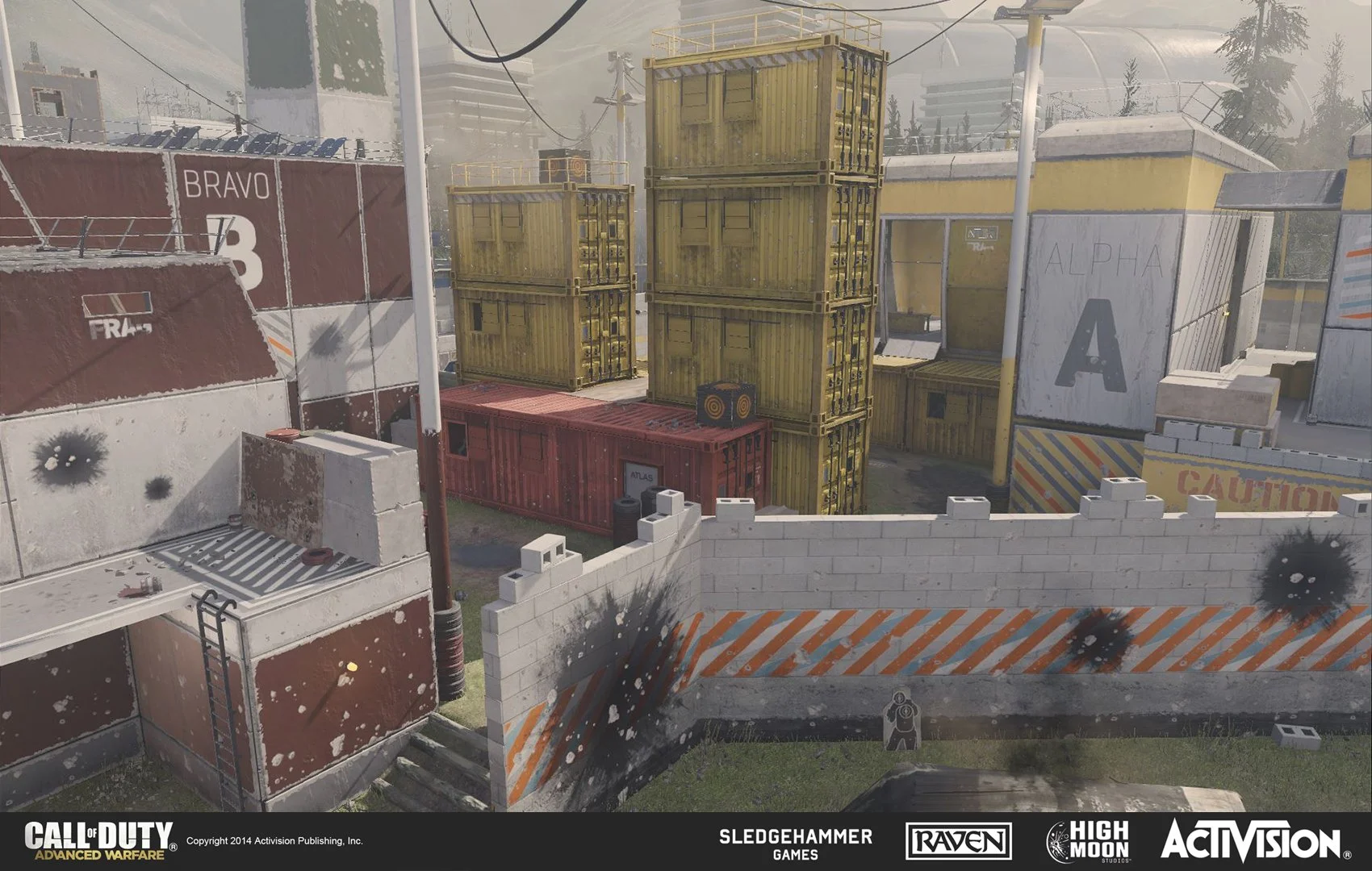 A scene from the video game Call of Duty: Advanced Warfare showing a military-style training or combat environment with stacked shipping containers, a brick wall, and a sandy, outdoor setting with trees and buildings in the background.