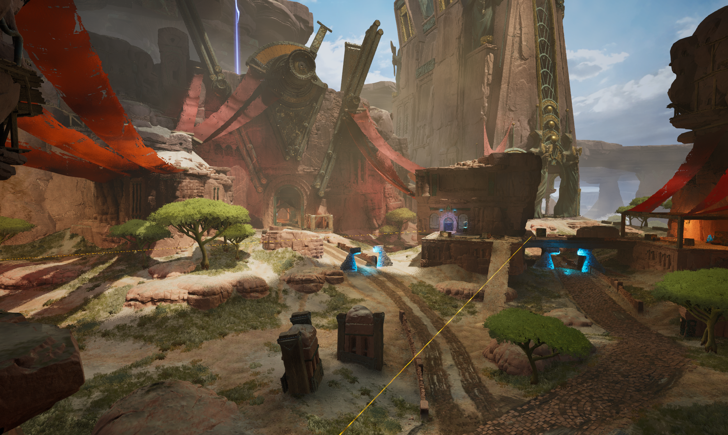 A digital landscape featuring a rocky, desert-like environment with sparse green trees, pathways, and futuristic structures with glowing blue lights. A large, ancient-looking mechanical or robotic structure is seen in the background, with red fabric-