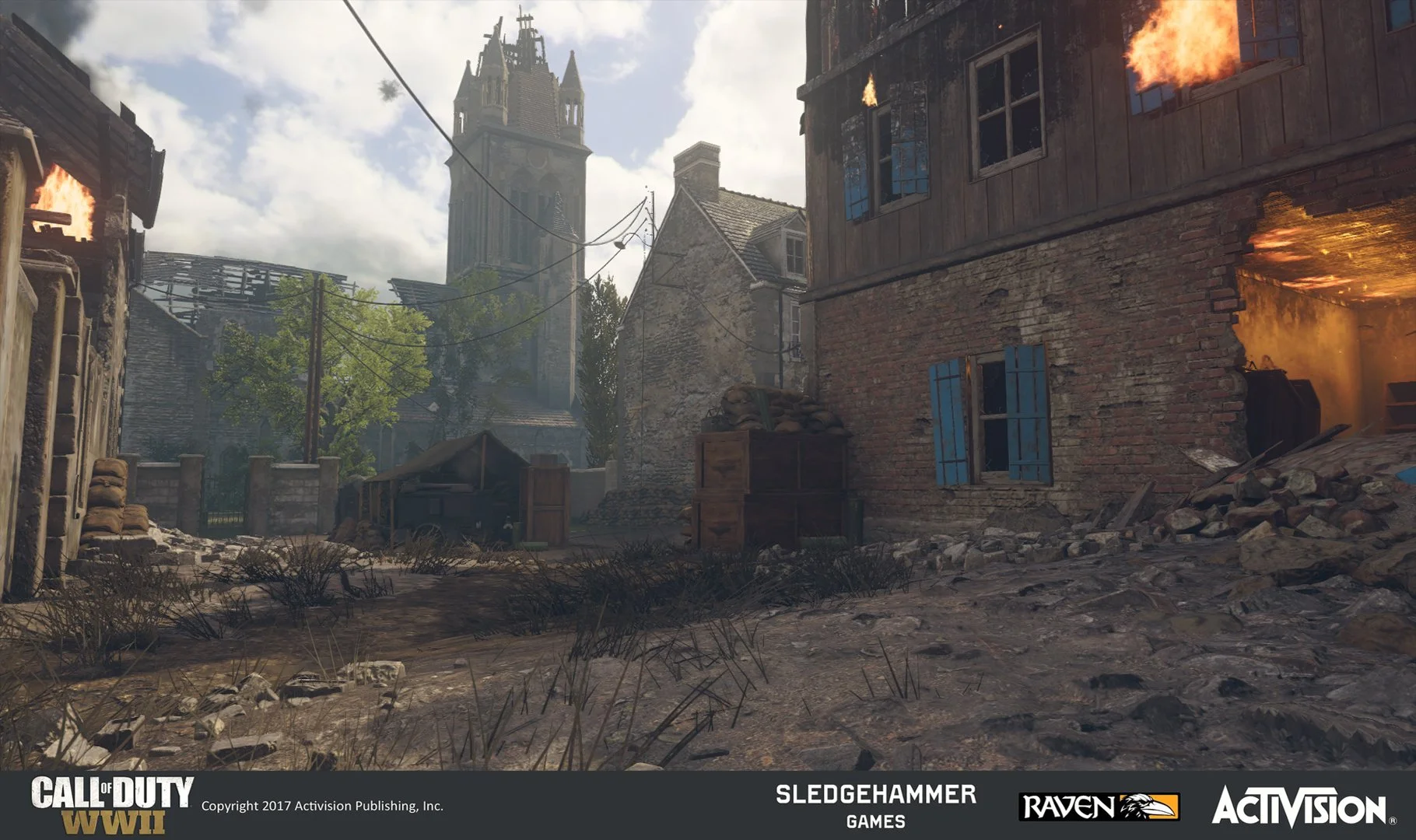 A war-torn urban scene from Call of Duty WWII, featuring damaged buildings on fire, debris, and a church steeple in the background.