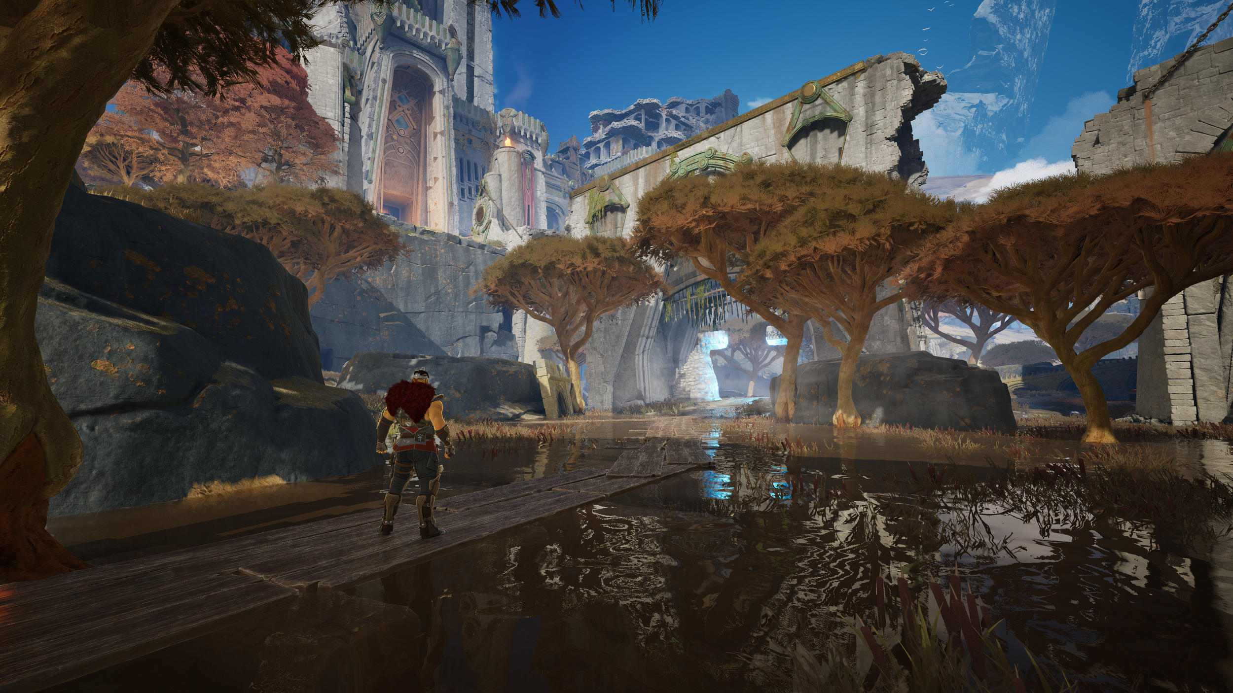 A scene from a video game depicting a character walking on a wooden pathway surrounded by water and trees with a large castle in the background under a blue sky.