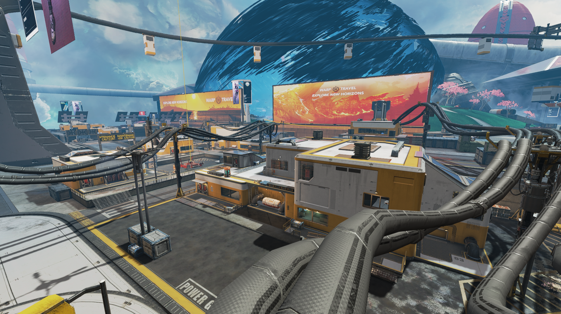 A futuristic cityscape with advanced buildings, large digital billboards, and multiple pipelines and cables running across rooftops, set against a backdrop of a mountain and a colorful sky.