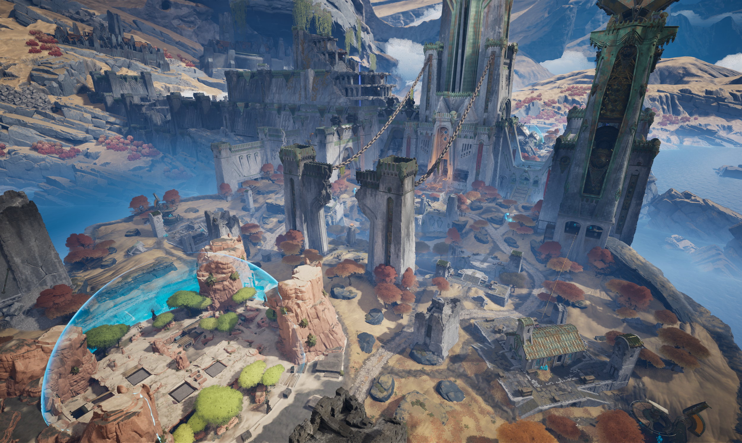 A fantasy landscape featuring a large, ancient city with tall, ruined towers, bridges, and structures, surrounded by mountains and water, with autumn trees and a blue sky.