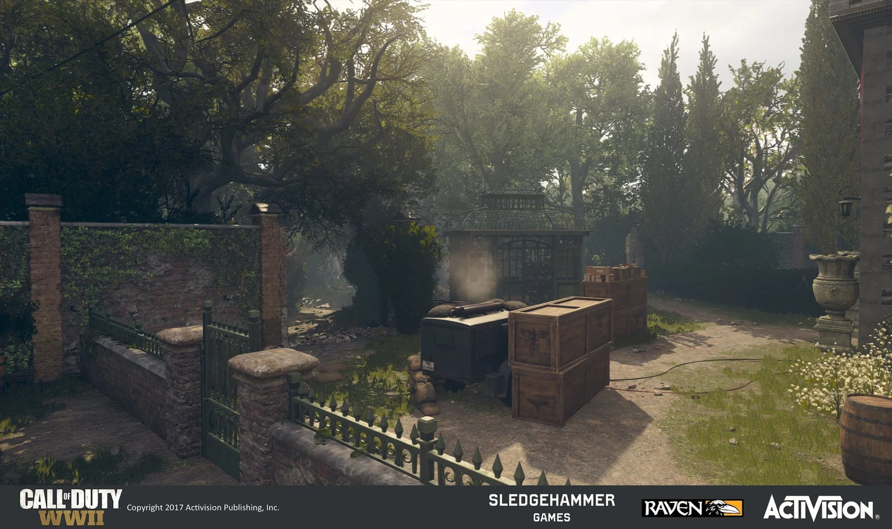 A backyard scene from a video game featuring a brick fence, an iron gate, trees, crates, a trash bin with smoke, and a stone fountain, with the Call of Duty WWII logo and developer information at the bottom.