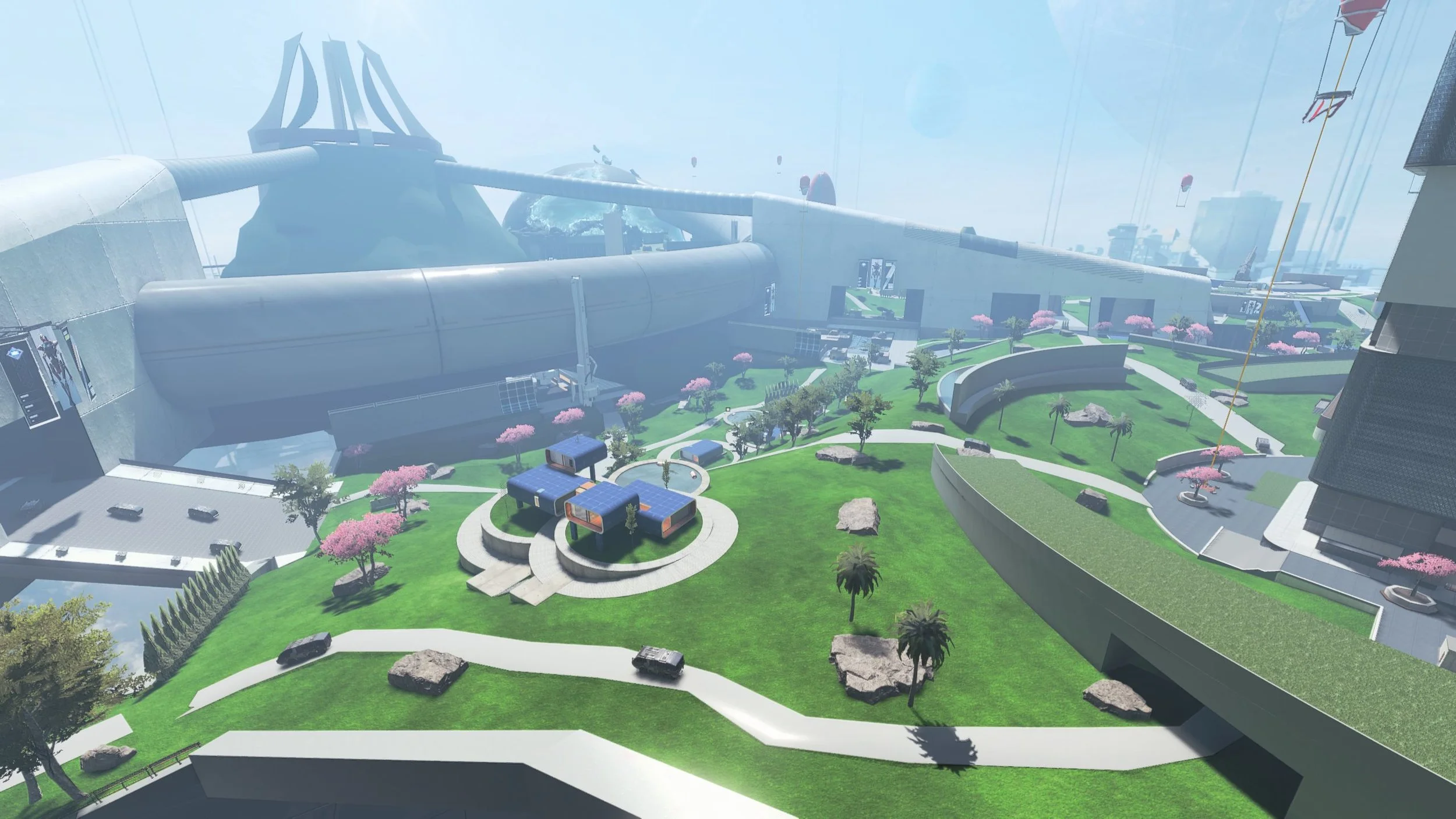 Futuristic cityscape with modern buildings, green park, pink-blossomed trees, and a large structure with a sail-like design in the background.