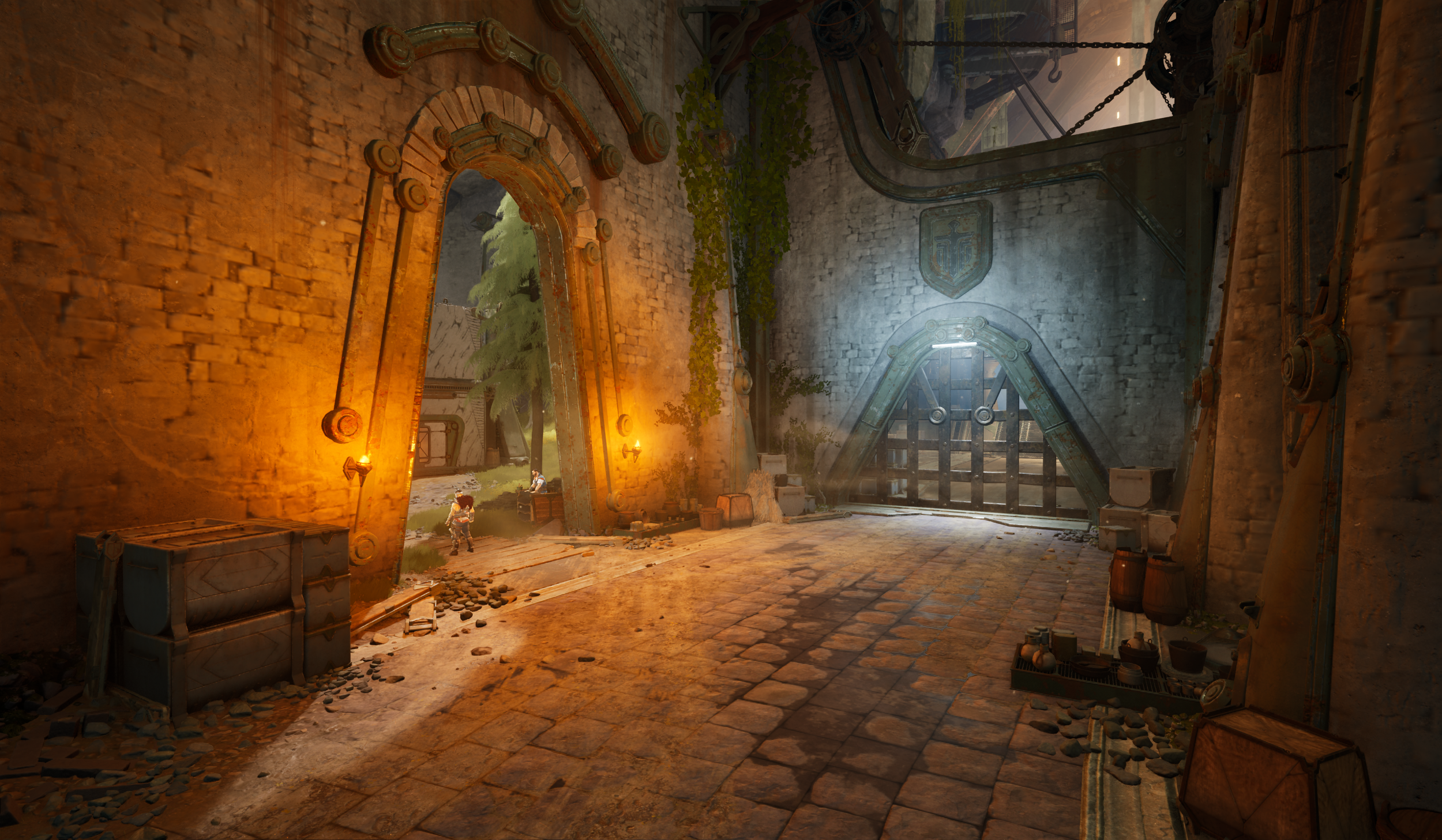 A large, industrial-style room with brick walls and metal machinery. The room has a large arched doorway leading outside, where two characters are visible. Sunlight streams in through the doorway, illuminating the space. The floor is made of cobblest