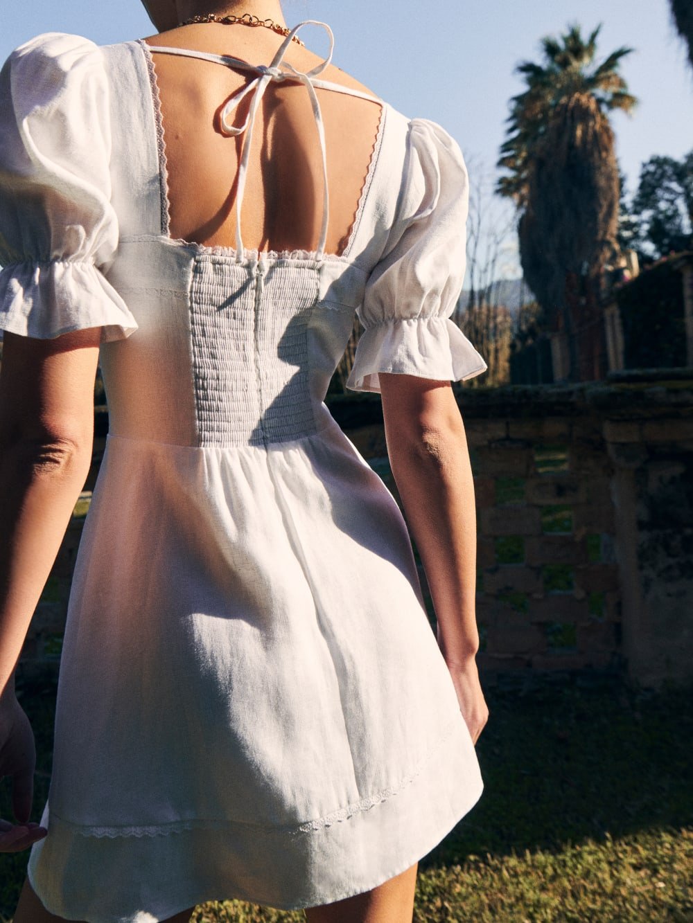 This Reformation dress uses shirring to "cheat" on fit