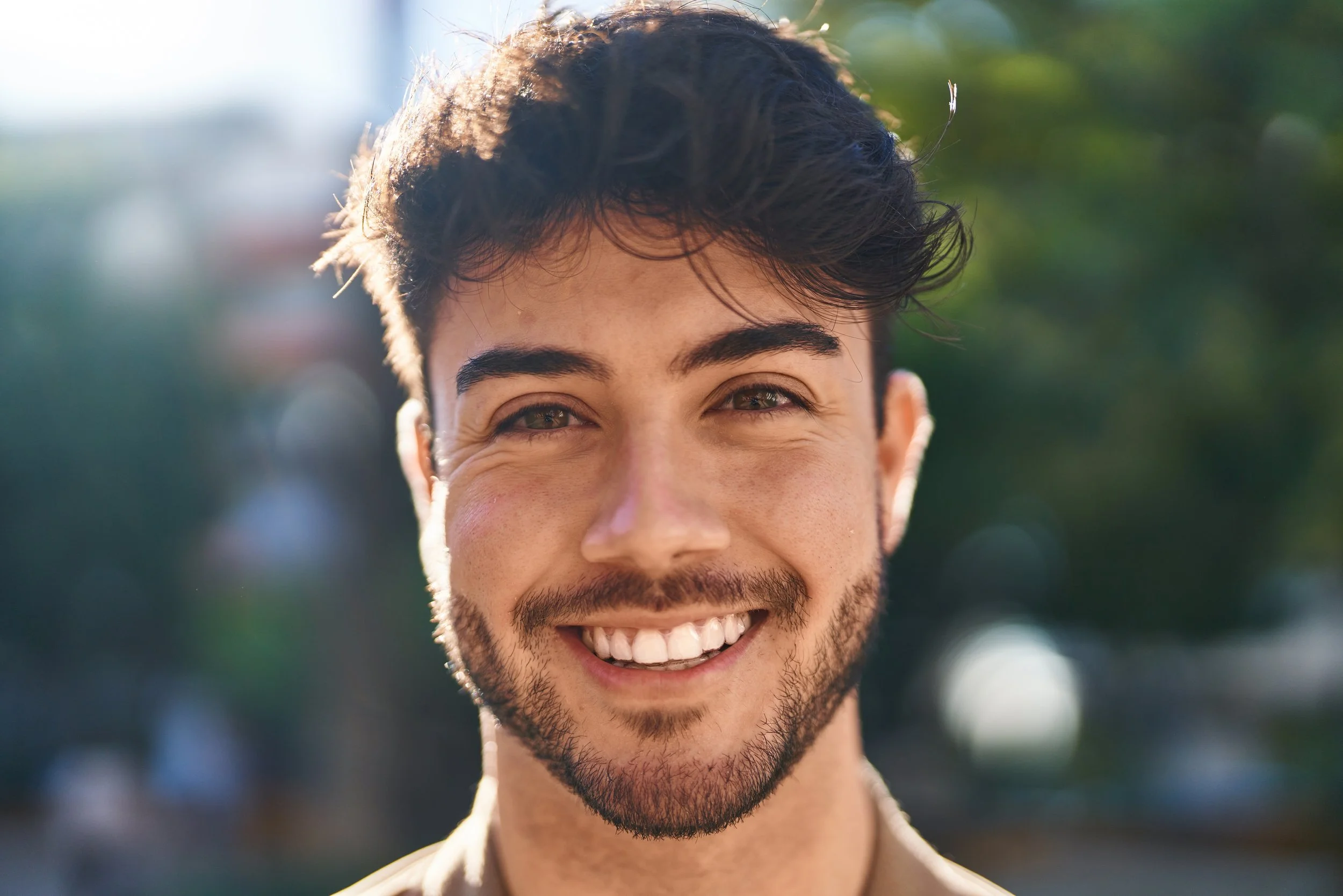 man looking at camera smiling